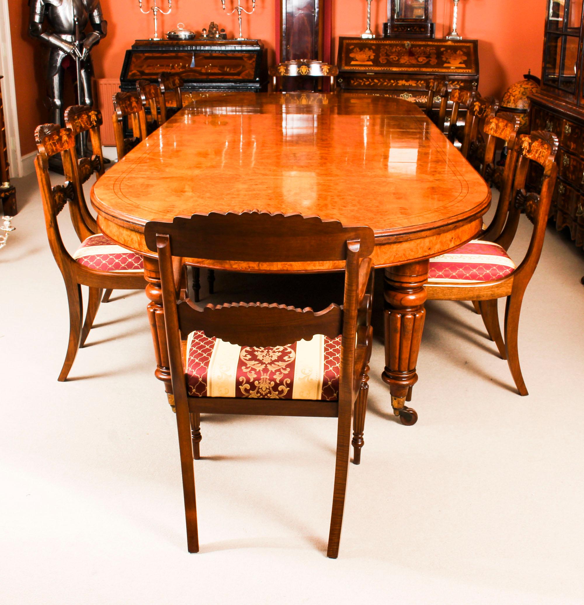 There is no mistaking the style and design of this exquisite dining set comprising an antique Victorian pollard oak and black line inlaid extending dining table, circa 1840 in date with a bespoke set of twelve dining chairs.

This amazing table
