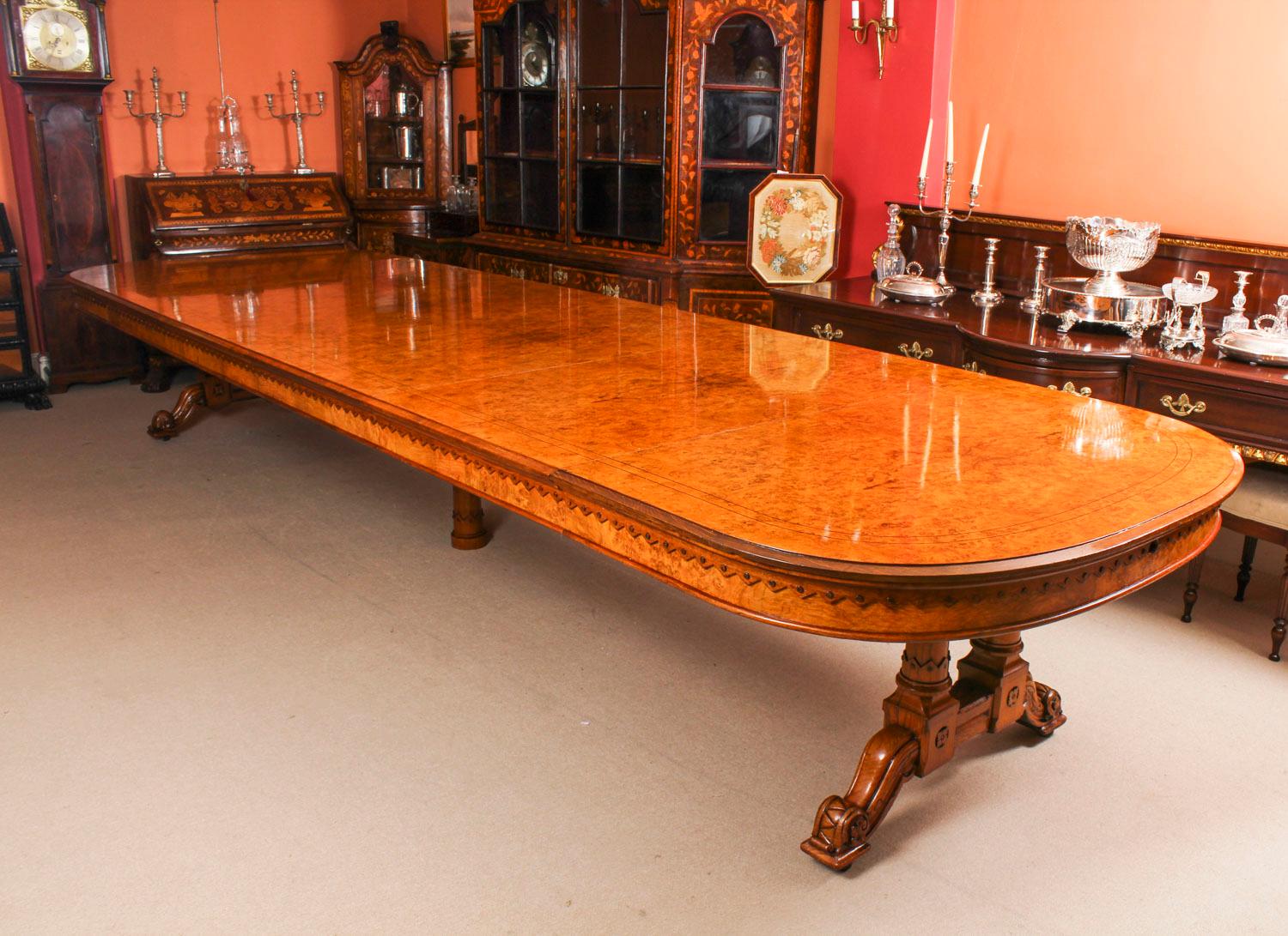There is no mistaking the style and design of this exquisite dining set comprising an antique Victorian pollard oak and black line inlaid extending dining table, circa 1870 in date with a bespoke set of sixteen dining chairs.

This stunning table