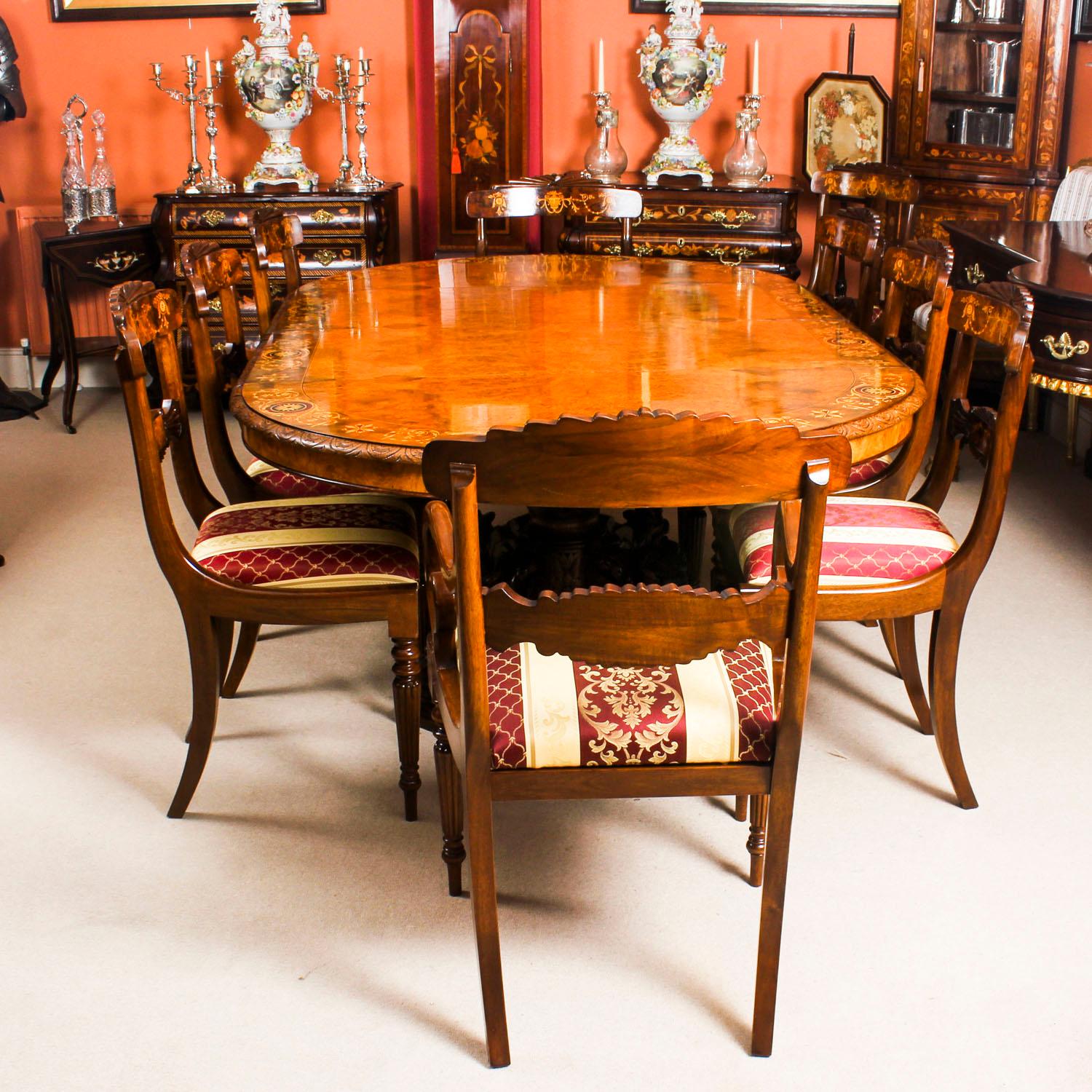 There is no mistaking the style and design of this exquisite Victorian pollard oak and marquetry dining set comprising an extending dining table, circa 1880 in date with eight bespoke marquetry chairs. 

This stunning table has two leaves which