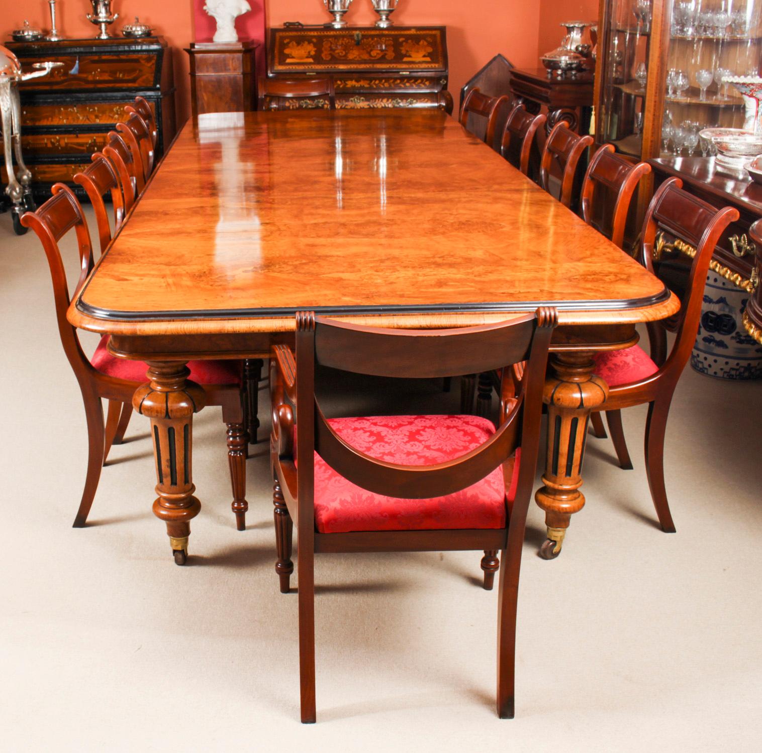 There is no mistaking the style and sophisticated design of this exquisite dining set comprising a rare English antique Victorian pollard oak extending dining table, circa 1860 in date and a set of twelve vintage dining chairs. 
The styles that