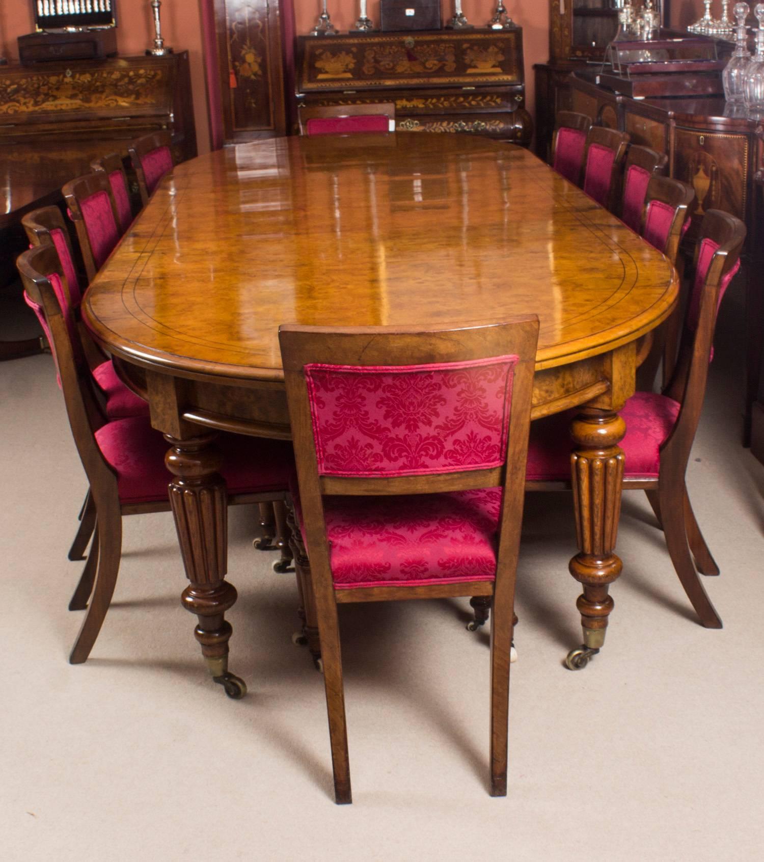 There is no mistaking the style and sophisticated design of this exquisite dining set comprising a rare English antique Victorian pollard oak extending dining table, circa 1840 in date and a set of 12 antique dining chairs, circa 1870 in date. 
The