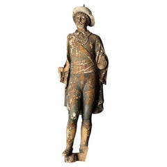 Figure italienne ancienne sculptée à la main d'un homme polychrome, décorée