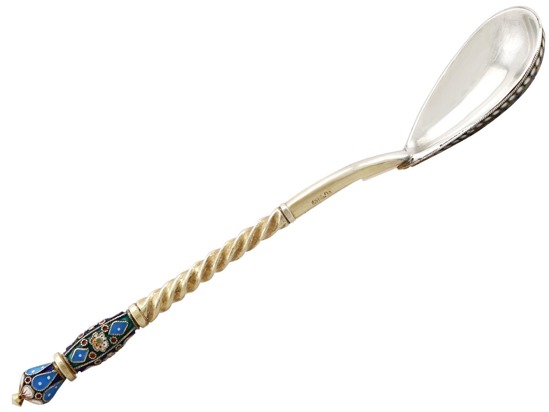An exceptional, fine and impressive antique Russian silver gilt and polychrome cloisonné enamel spoon; an addition to our Russian silverware collection.

This exceptional antique Russian silver gilt and polychrome cloisonné enamel spoon has an