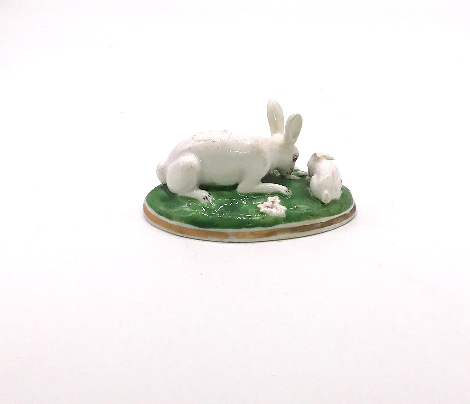 The fox's prey is the rabbit, and in the 19th century, rabbits abound in the countryside, so it is no surprise they are find in porcelain toys. Adorable Chamberlain Worcester porcelain rabbit mother with her young, in white on a green oval base, 3