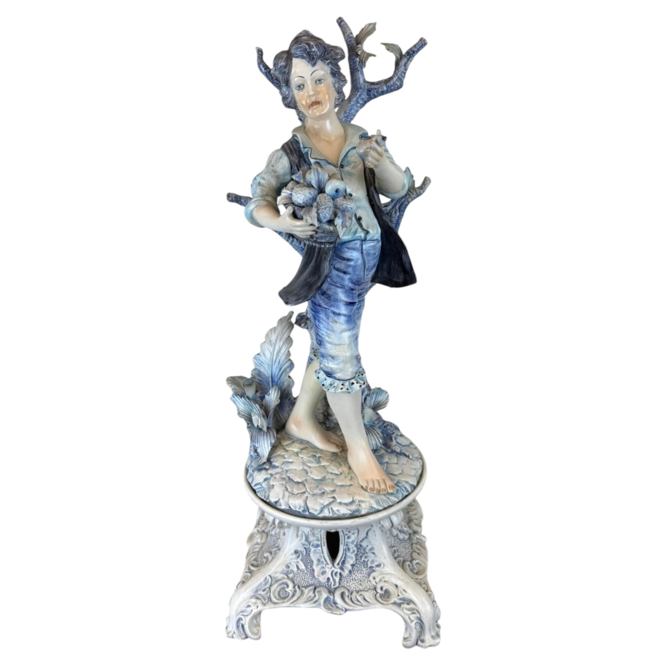 Antique Porcelain Figurative Sculpture of a Boy with Fruit Basket, 19th Century