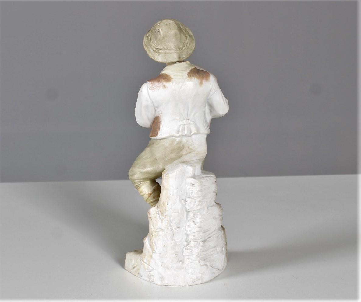 Hand-Painted Antique Porcelain Figure by 