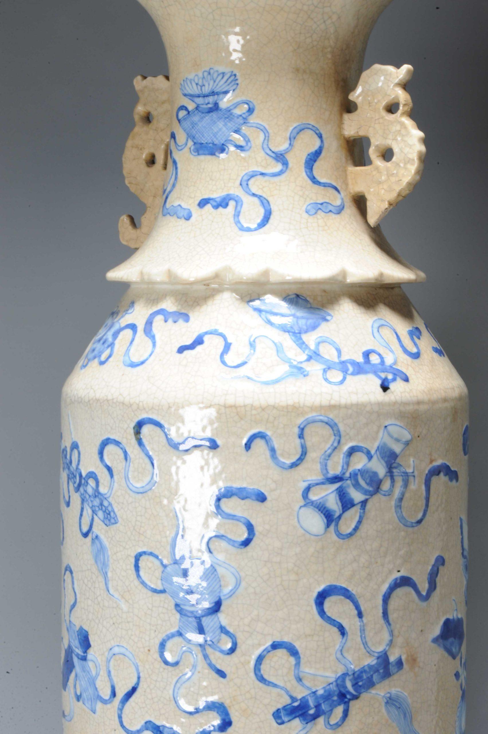 Lovely and large vase with great blue and white decoration of blue and white valuables. With animal handles.

Pierced hole in the base.

Additional information:
Material: Porcelain & Pottery
Region of Origin: China
Period: 19th century
Condition:
