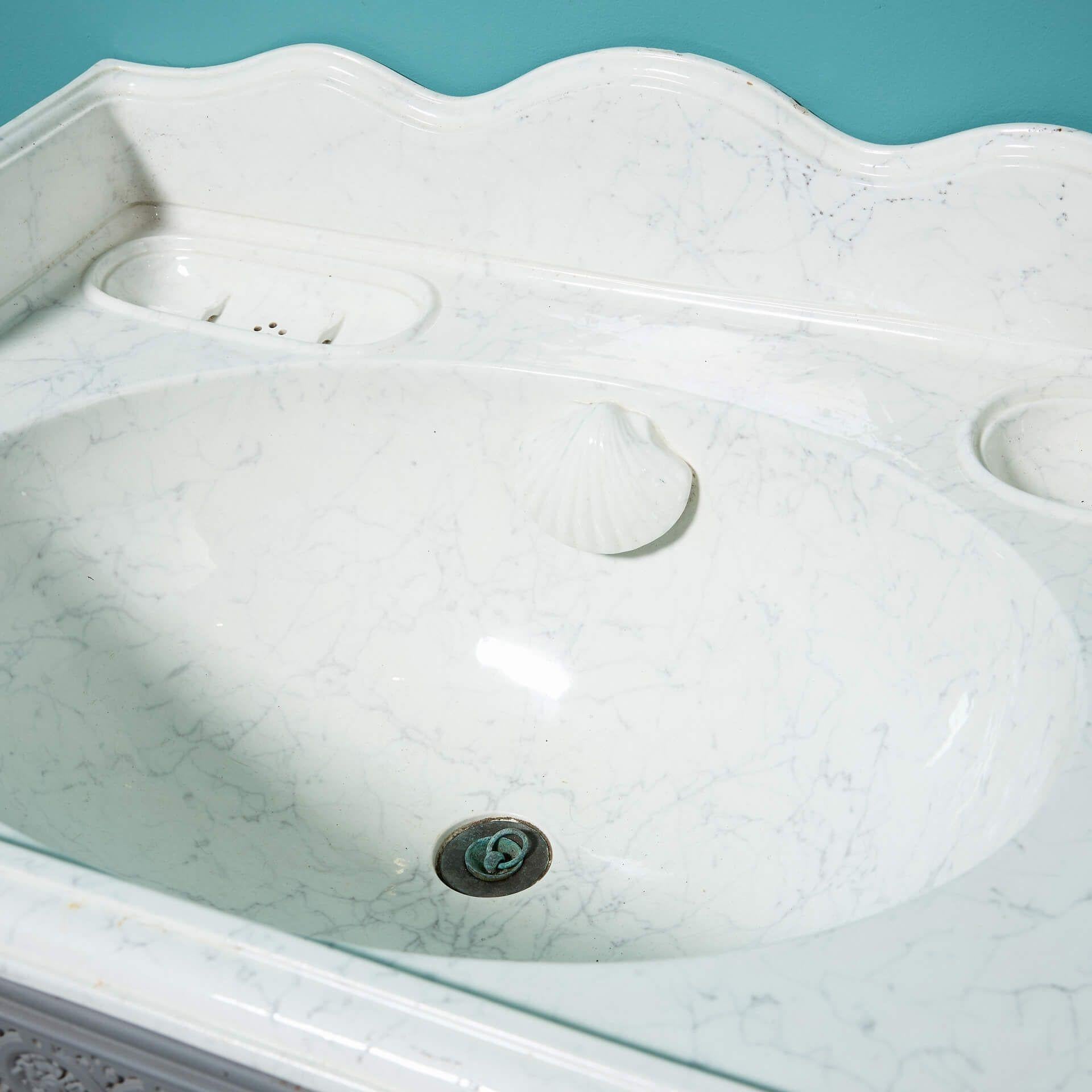 Lavabo de porcelana antigua efecto mármol con soporte Victoriano en venta