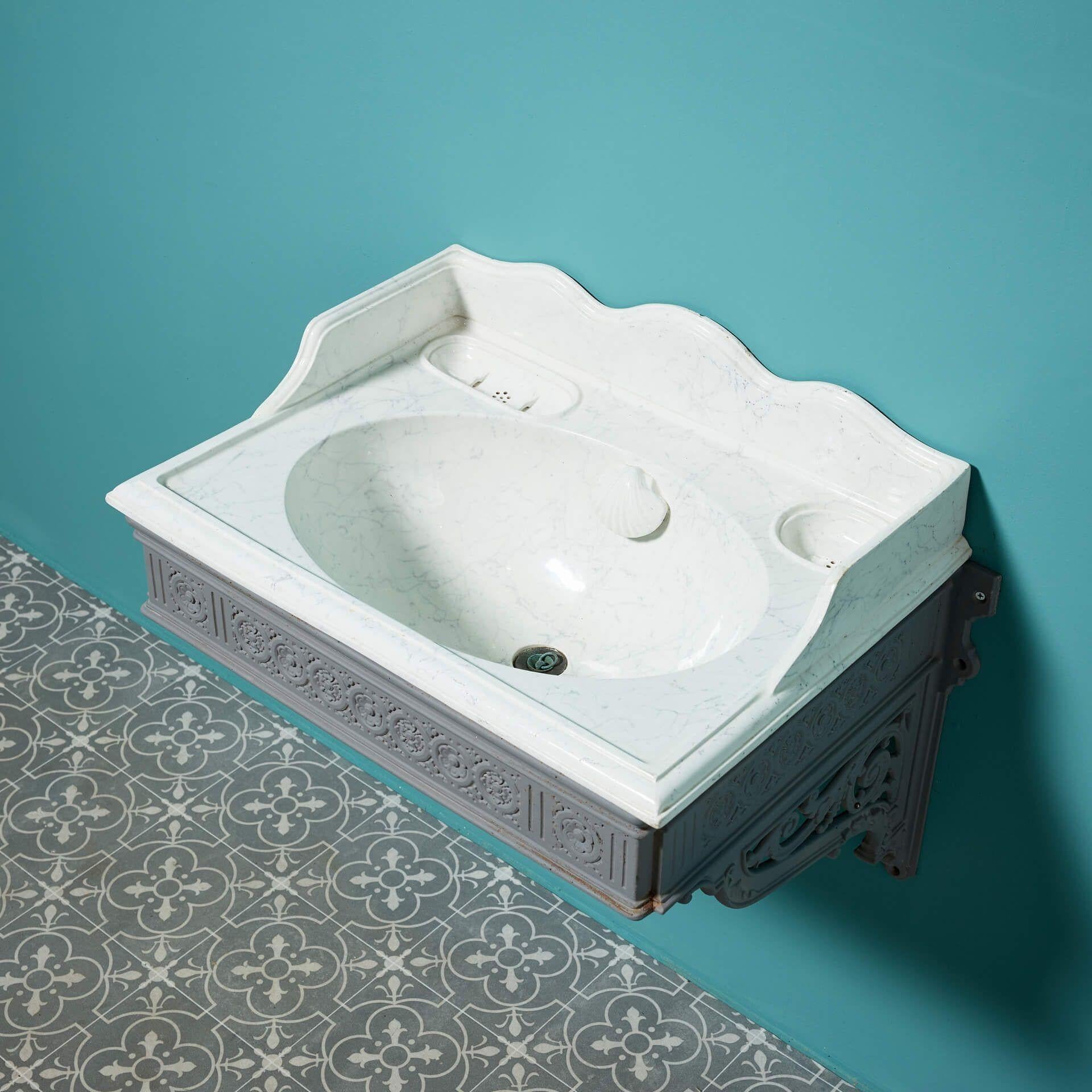 Lavabo de porcelana antigua efecto mármol con soporte siglo XIX en venta