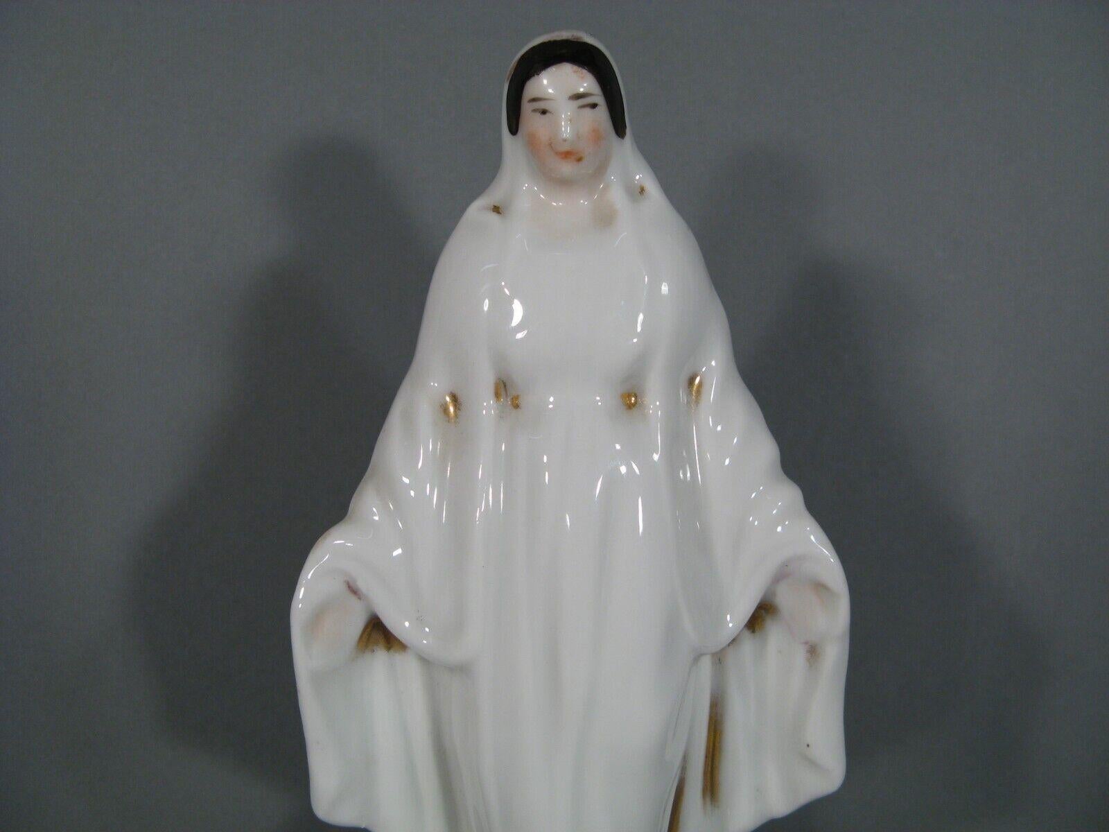This exquisite antique porcelain statue, crafted in Paris, depicts the Virgin Mary with elegant detail. Dating back to the late 19th or early 20th century, this piece embodies the delicate artistry of the era.

Product Details:

Era: Late 19th/Early
