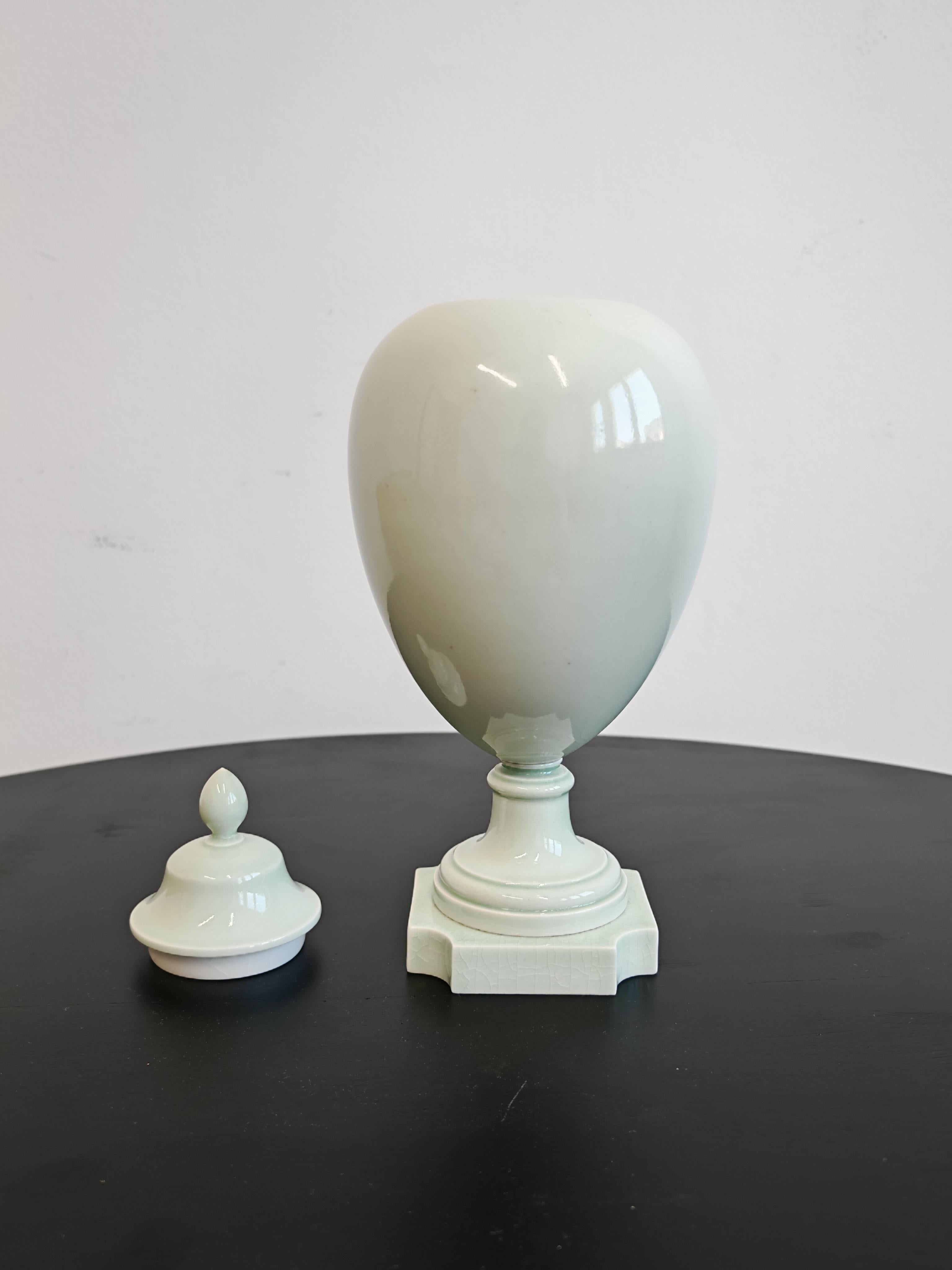 French Antique Porcelain Urn in pale green glaze, by Sevres, France 19th Century For Sale