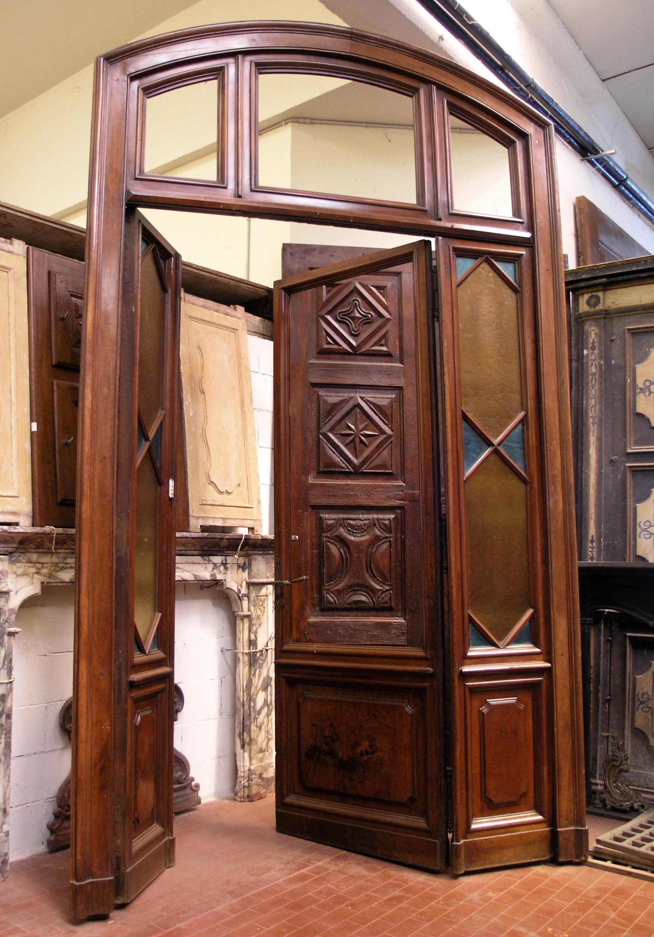 Hand-Carved Antique Portal with Original Glass Window For Sale