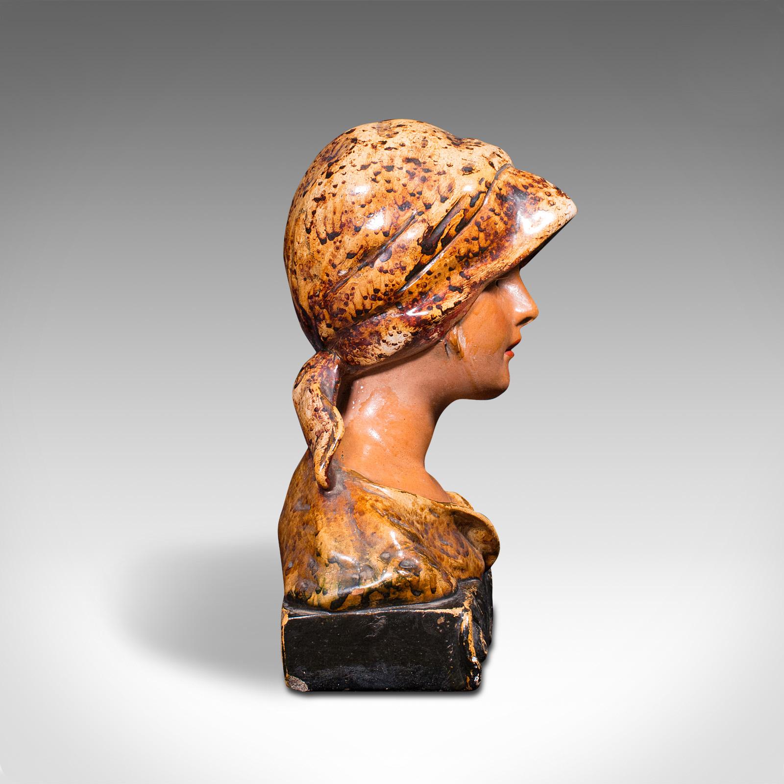 This is an antique portrait bust. A French, plaster decorative female figure, dating to the late Victorian period, circa 1900.

A fin de siècle Parisian young woman in the Art Nouveau manner
Displays a desirable aged patina and in good
