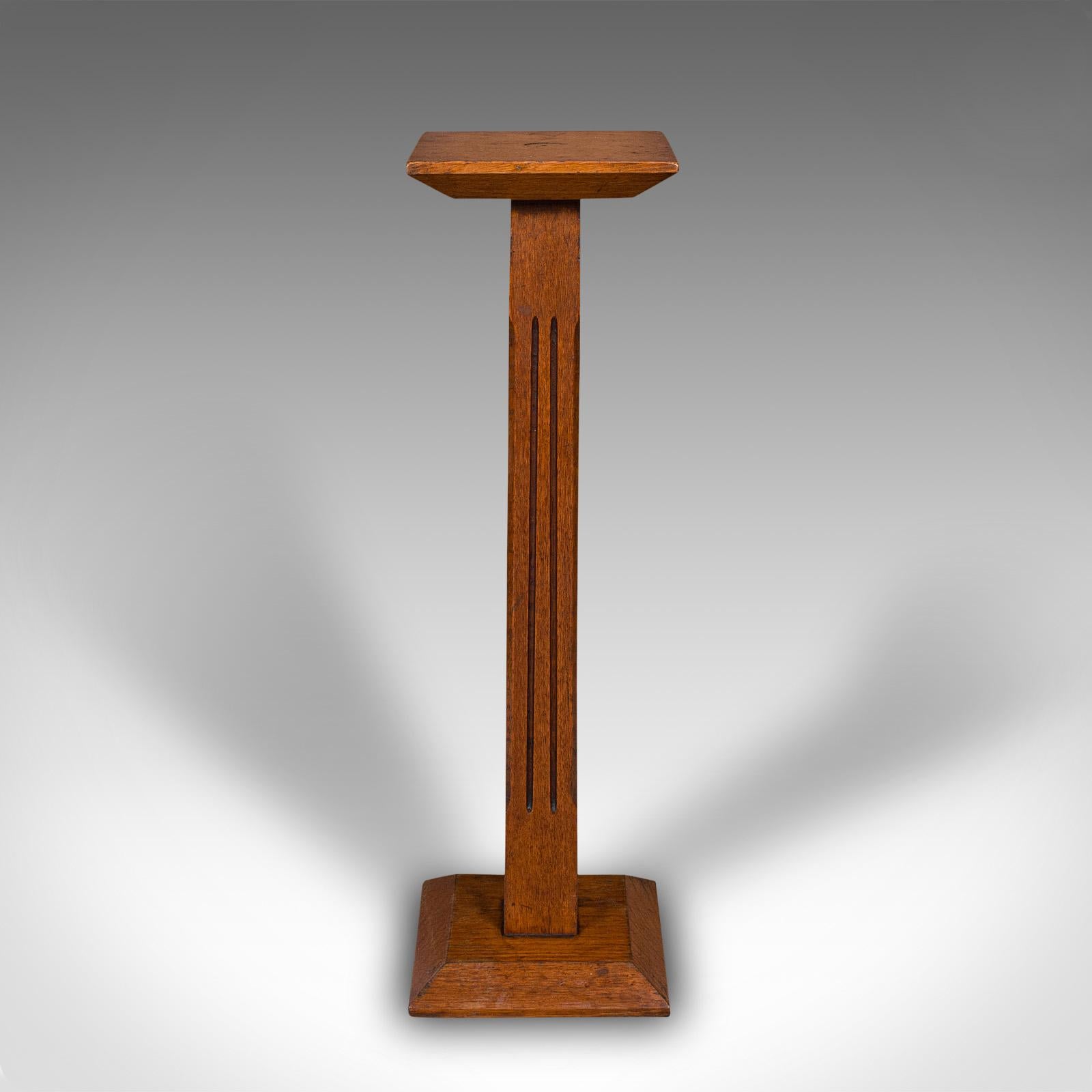 This is an antique portrait bust stand. An English, oak jardiniere or torchere column, dating to the Victorian period, circa 1880.

Attractive antique stand, ideal for hosting a portrait bust or figure.
Displaying a desirable aged patina and in