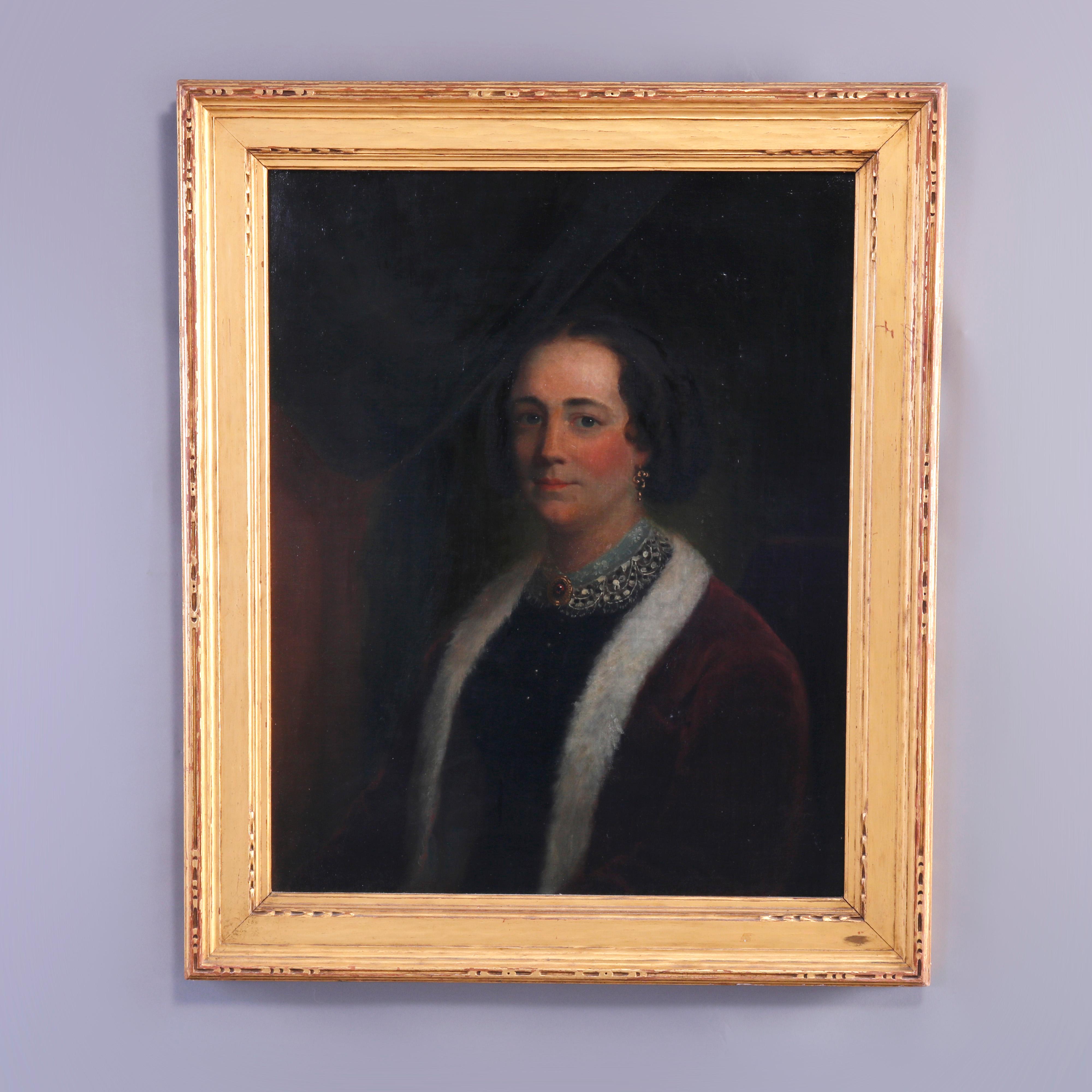 An antique painting offers oil on canvas (laid on board) portrait of a woman, seated in Newcomb Macklin School giltwood frame, c1910

Measures - overall 36.5'' H x 30.5'' W x 2'' D; sight 24.25'' x 31''.