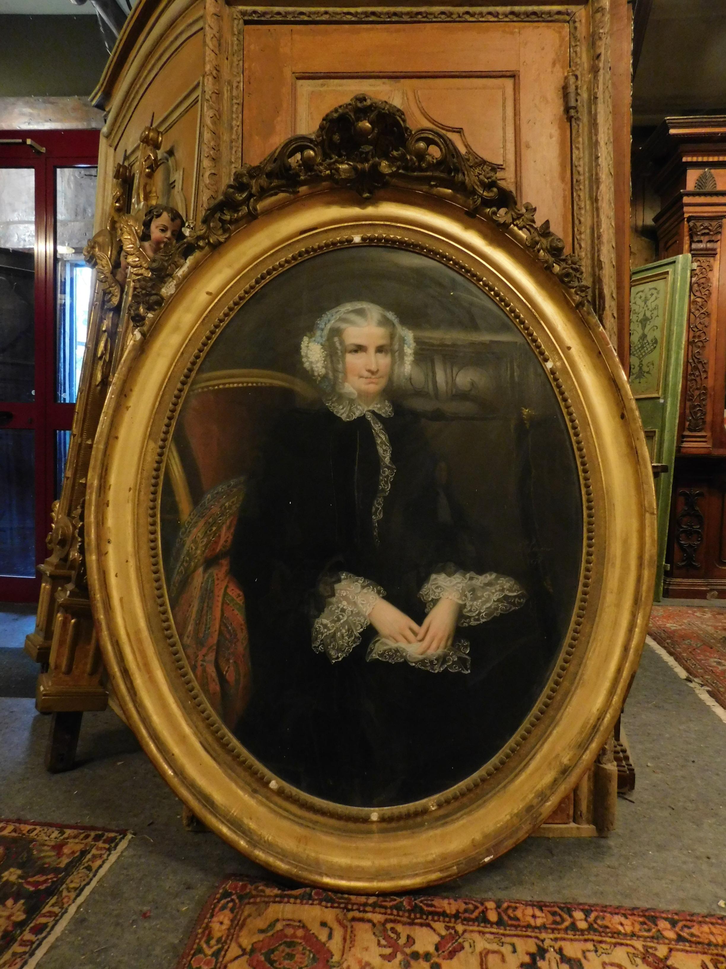 Antique portrait with golden frame, depicting an ancestor of a noble family. hand-drawn and hand-made by an artist who signs himself: A. Laugien, dated 1851. Measures cm W 125 x H 170 x D 17. Precious gilded frame, entirely hand-sculpted.