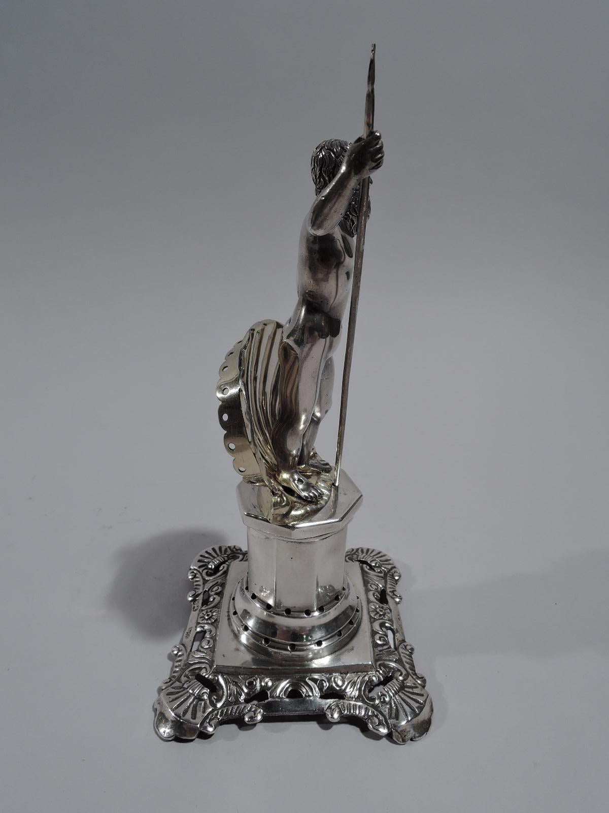 Portuguese neoclassical silver toothpick holder. A cast figure of trident-wielding Neptune stands in front of gilt scallop shell; both mounted to faceted pedestal with stepped base, which is pierced for inserting toothpicks. Foot has tooled flowers