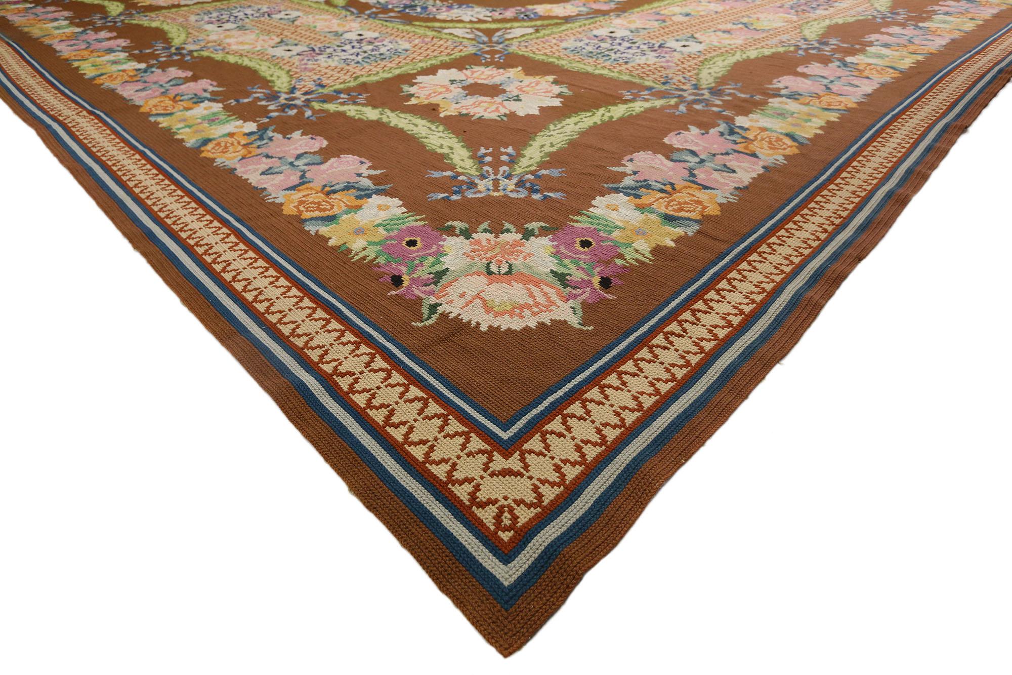 77321 Antique Portuguese Arraiolos Rug, 16'03 x 21'05.
French Romanticism meets Maximalism in this oversized antique Portuguese Arraiolos needlepoint rug. The highly decorative Aubusson design and happy hues woven into this piece work together