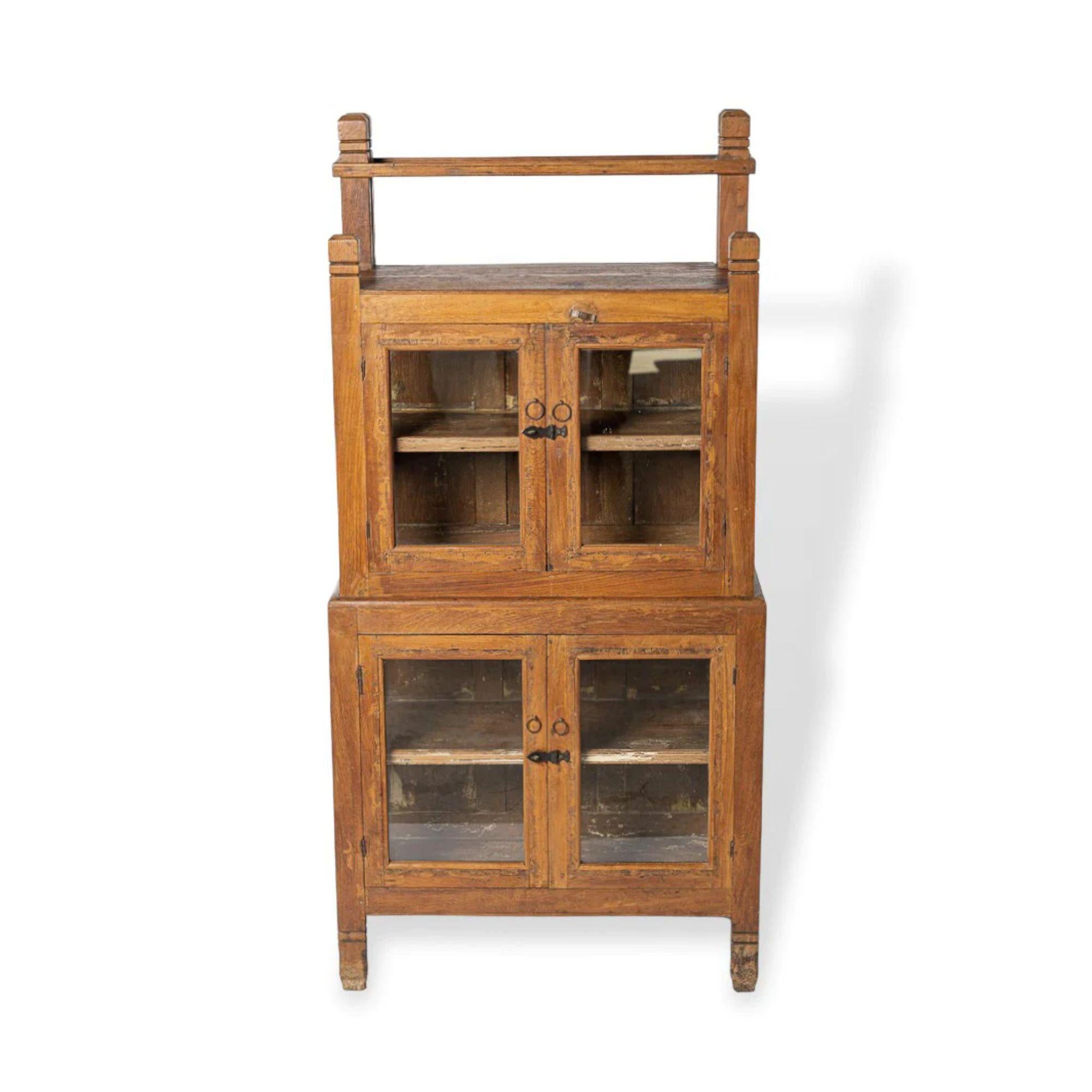 This incredible antique Portuguese wooden farmhouse display cabinet circa 1900 is perfectly aged with great rustic character. Meticulously handcrafted and thoughtfully designed with incredible detailing makes this one-of-a-kind cabinet a true