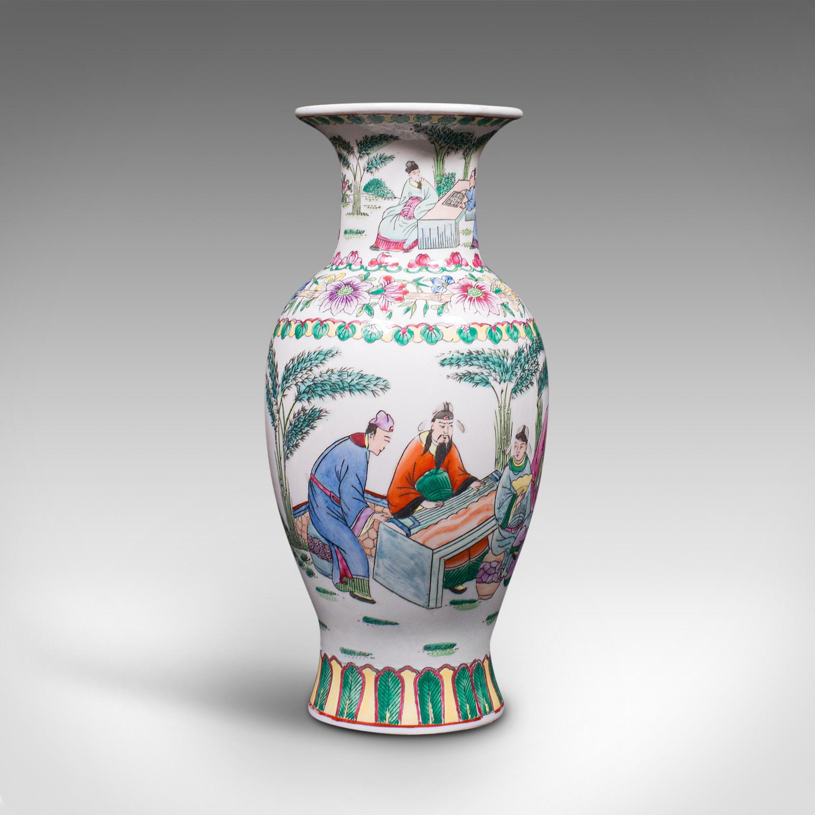 This is an antique posy vase. A Chinese, ceramic baluster urn with hand-painted decoration, dating to the late Victorian period, circa 1900.

Charming vase with fine detail and cheerful colour
Displays a desirable aged patina throughout
Crisp