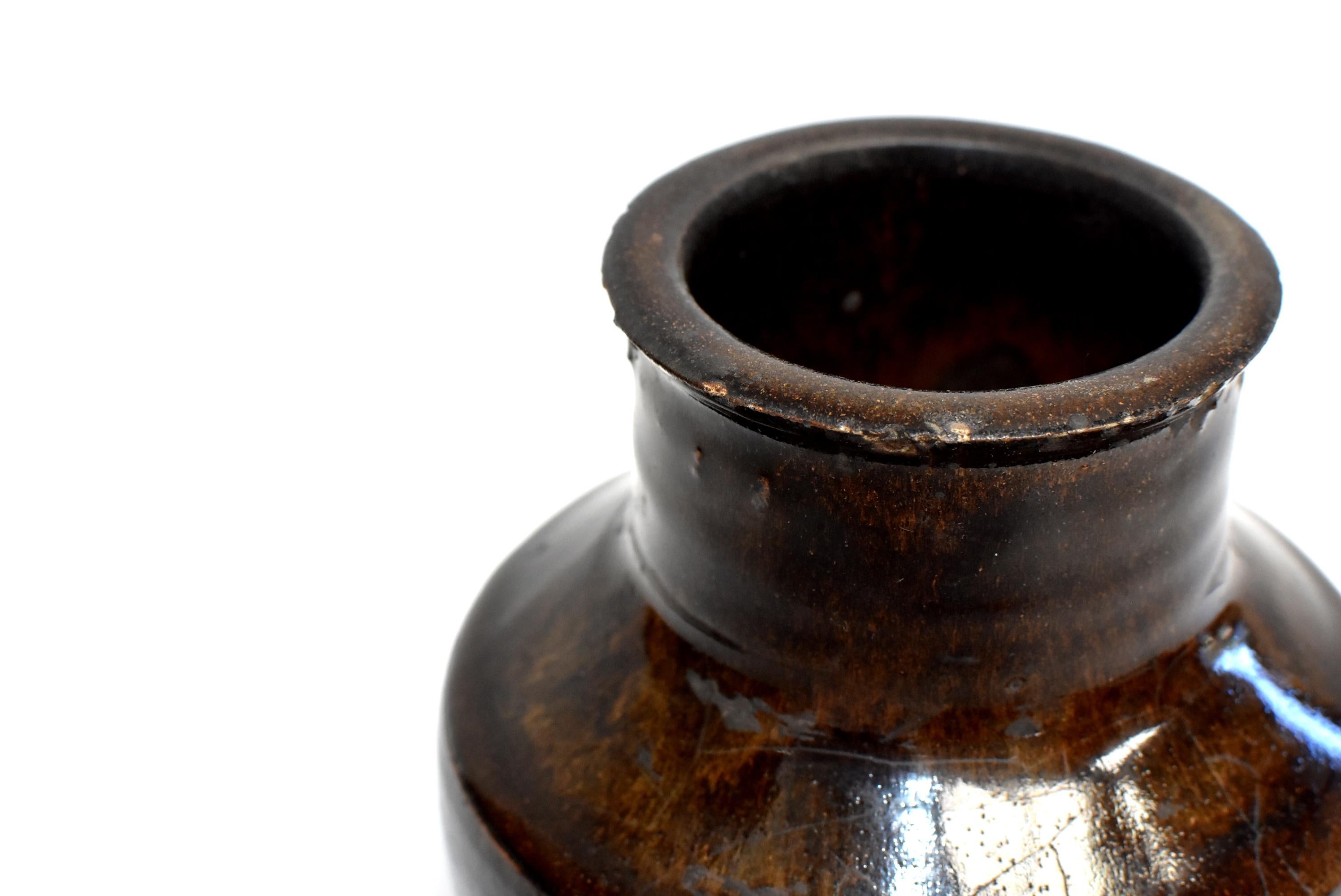 Poteries Pot de poterie ancien, à glaçure dorée en vente