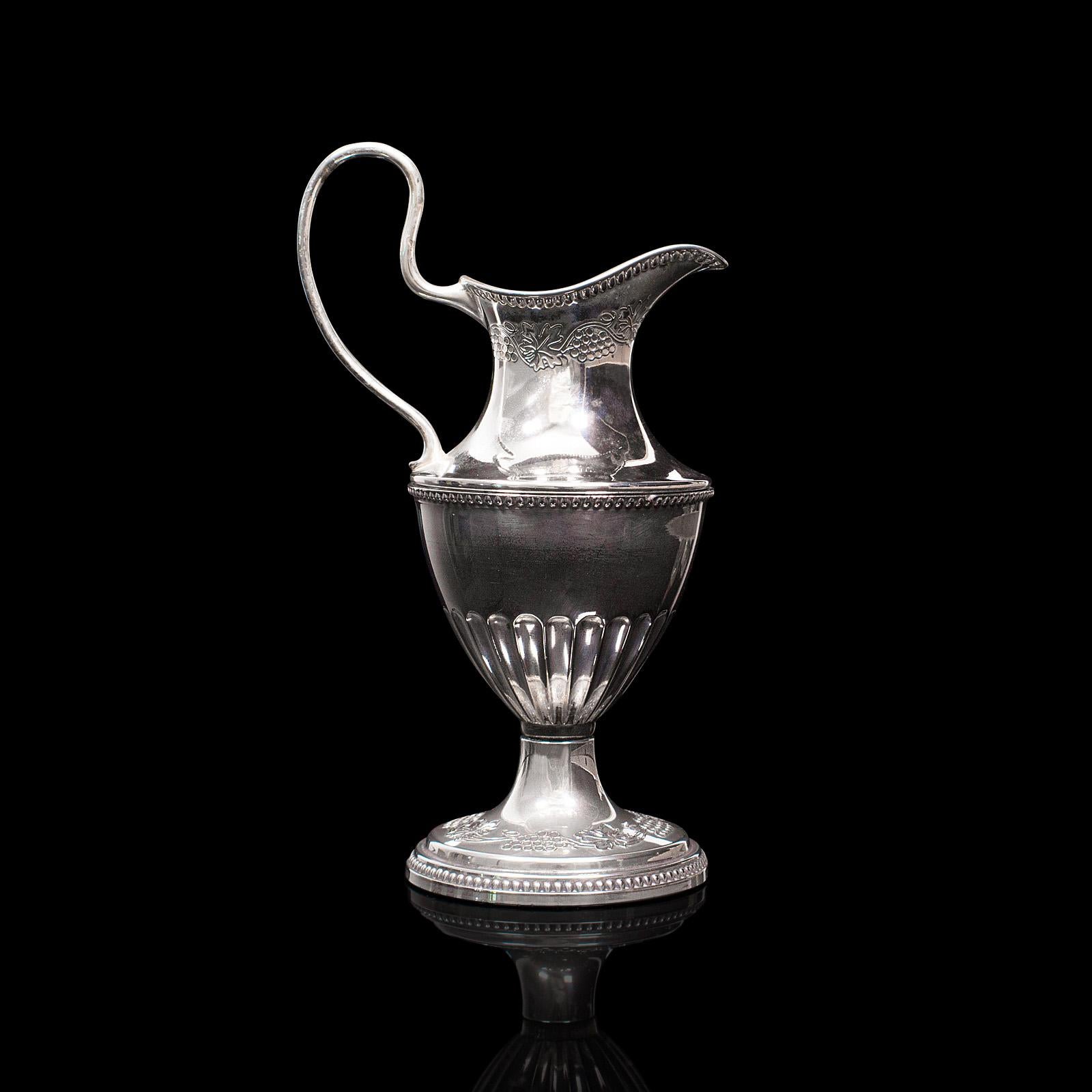 This is a small antique pouring jug. An English, silver plate decorative posy vase, dating to the Edwardian period, circa 1910.

Of delightfully petite form
Displays a desirable aged patina with minimal light tarnish
Polished silver plate
