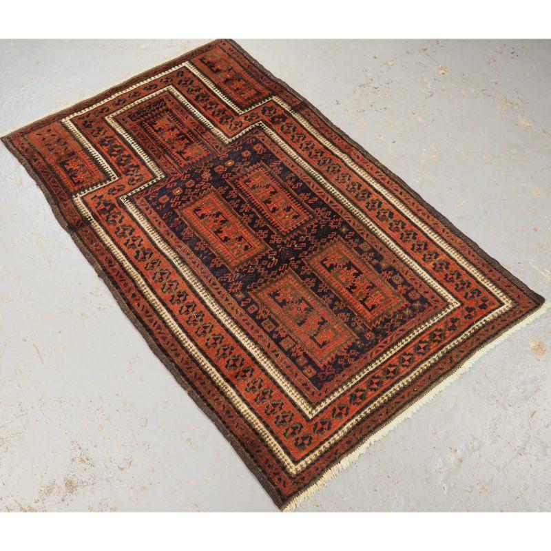 Antique prayer rug by the Yaqoub-Khani tribe with a scarce design.

This outstanding small prayer rug has the Yaqoub-Khani box design to the field on a dark indigo blue ground. There are very small highlights in green silk through out the rug.

The