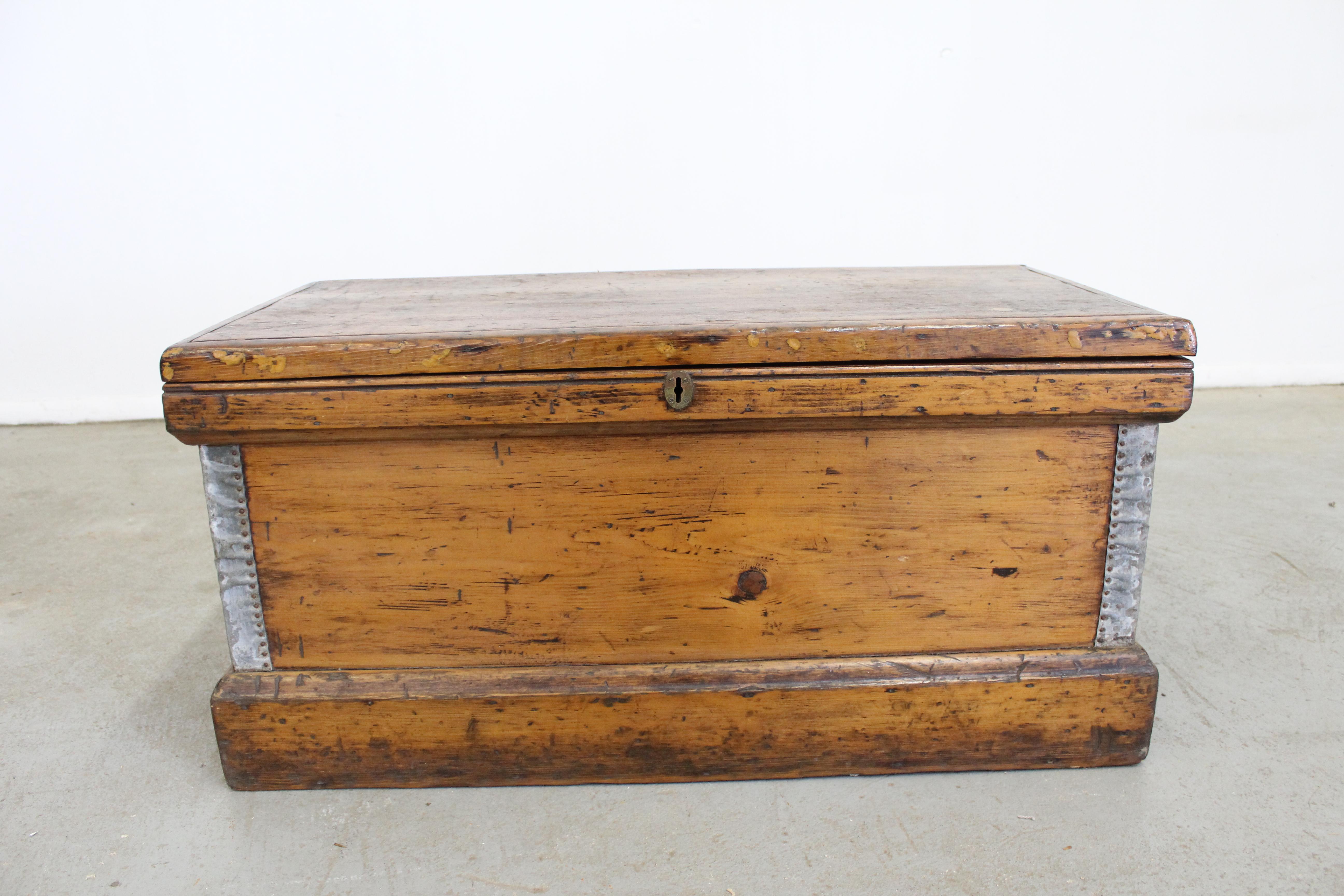 Offered is an Antique Civil War Officers Chest or Trunk made of solid wood with various compartments for storage inside. Features nailhead siding on the corners and includes a key. It is in good condition considering its age, showing normal wear