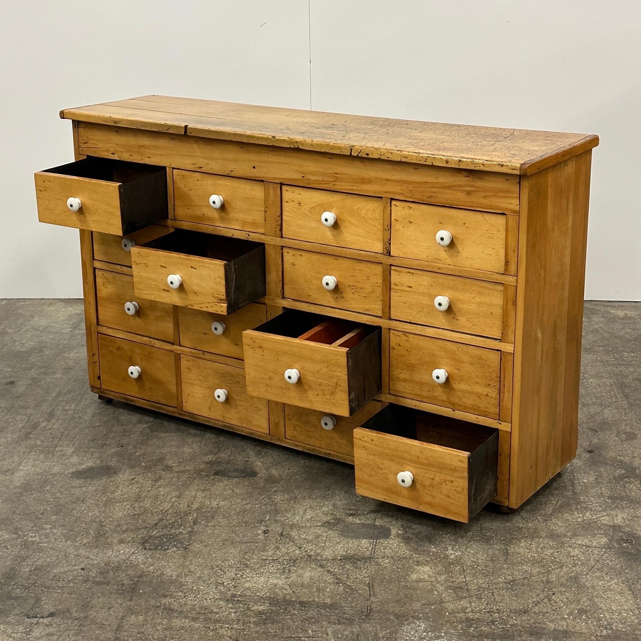 c. 1920s. Full wood construction with metal drawers. Ceramic knobs. One of a kind. 