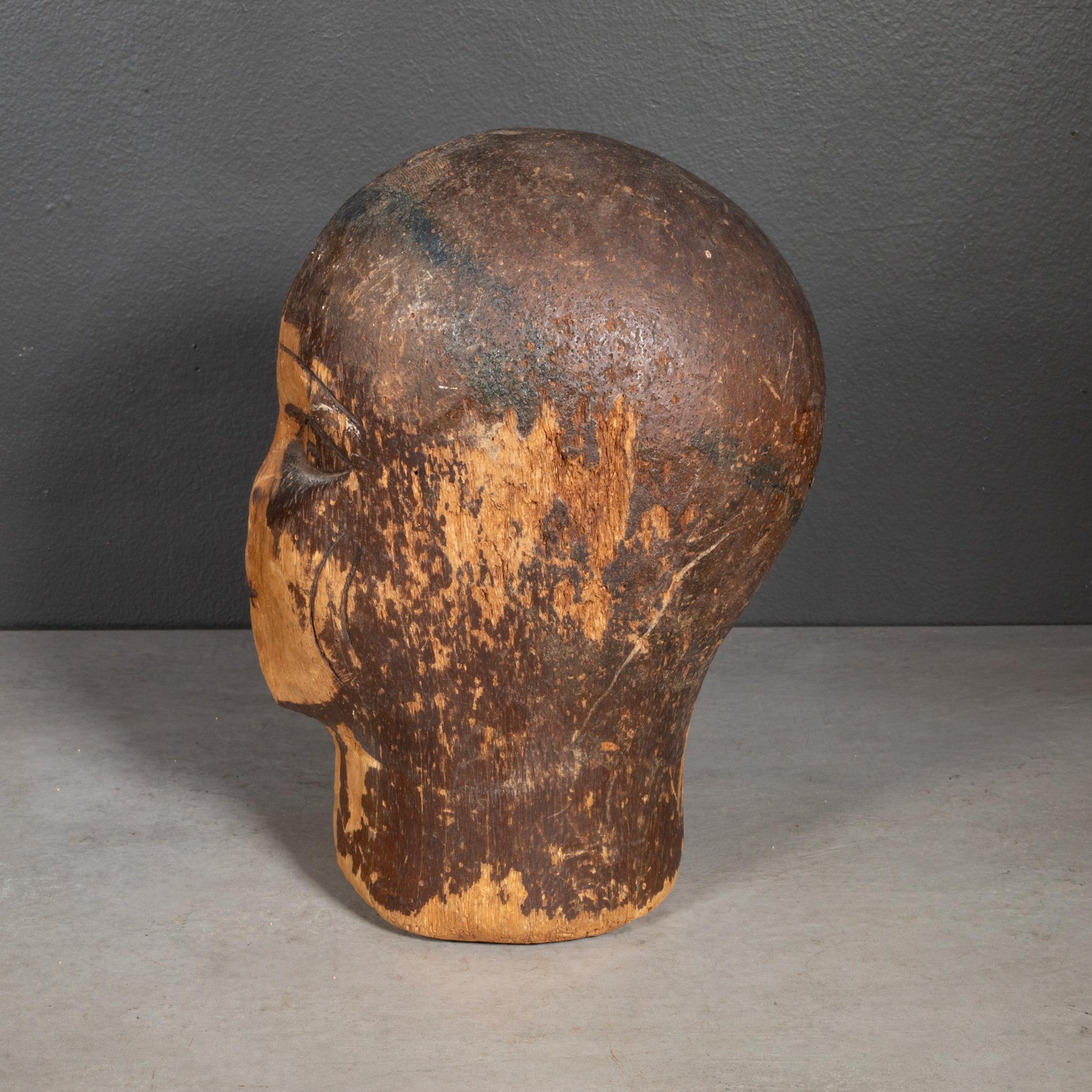 ABOUT

An original early 20th century cork mannequin display head. 
Shown with life size hand model for scale. 

    CREATOR Unknown.
    DATE OF MANUFACTURE c.1930-1940. 
    MATERIALS AND TECHNIQUES Cork. 
    CONDITION Good-Distressed. Wear