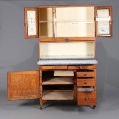 Antique Primitive Golden Oak and Enamel Hoosier Cabinet by Sellers, circa 1920