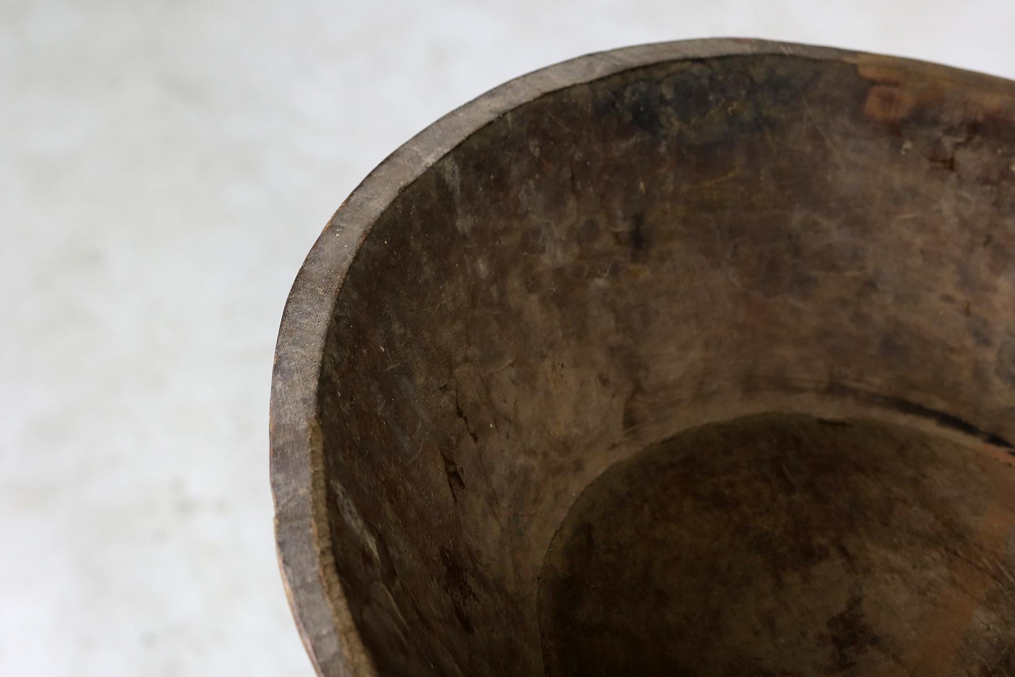 Beautiful old Indian vintage bowl, with great patina, every item is unique, we have several available, each piece is handmade and unique, hand carved solid wood, one piece. Handmade, natural item in a Wabi Sabi style. Slightly oval shape, Measures: