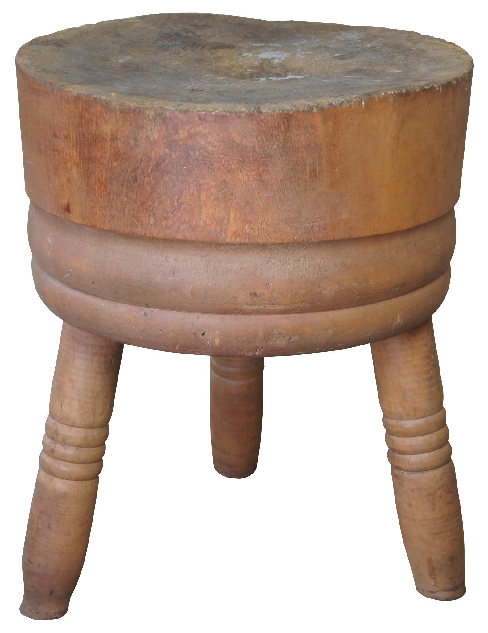 Antique farmhouse butcher block cutting board. Made of pine featuring round tripod form with turned legs. Pedestal, side accent table, plant stand. Measure: 28