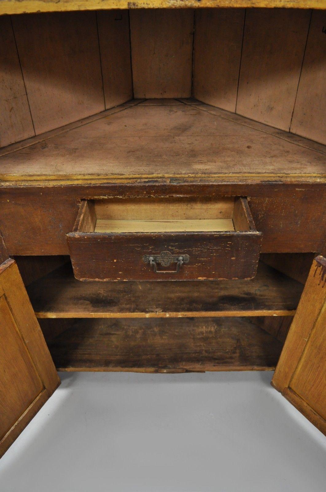 primitive corner cabinet