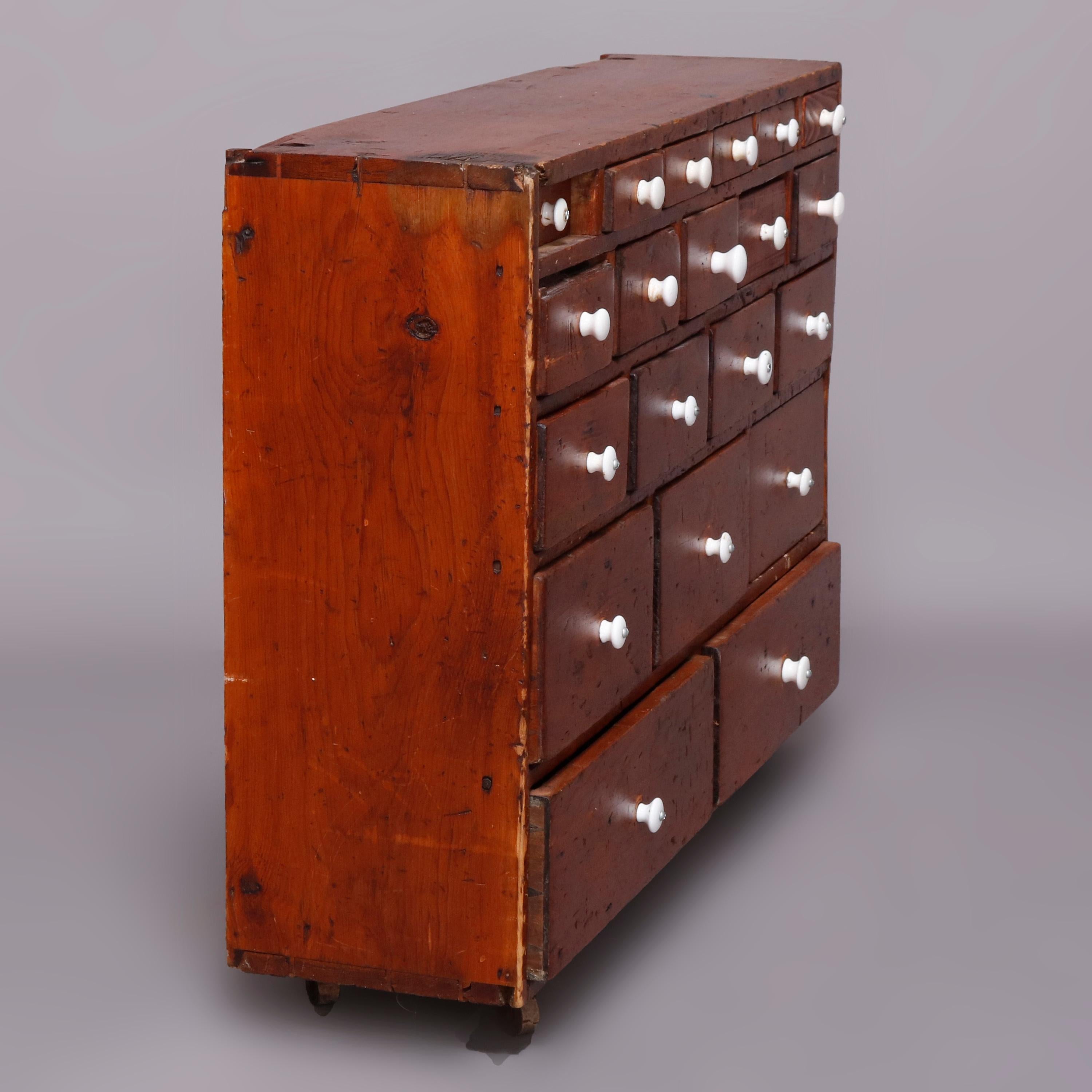 Primitive Softwood Apothecary Cabinet with 20 Graduated Drawers, 19th Century In Good Condition In Big Flats, NY