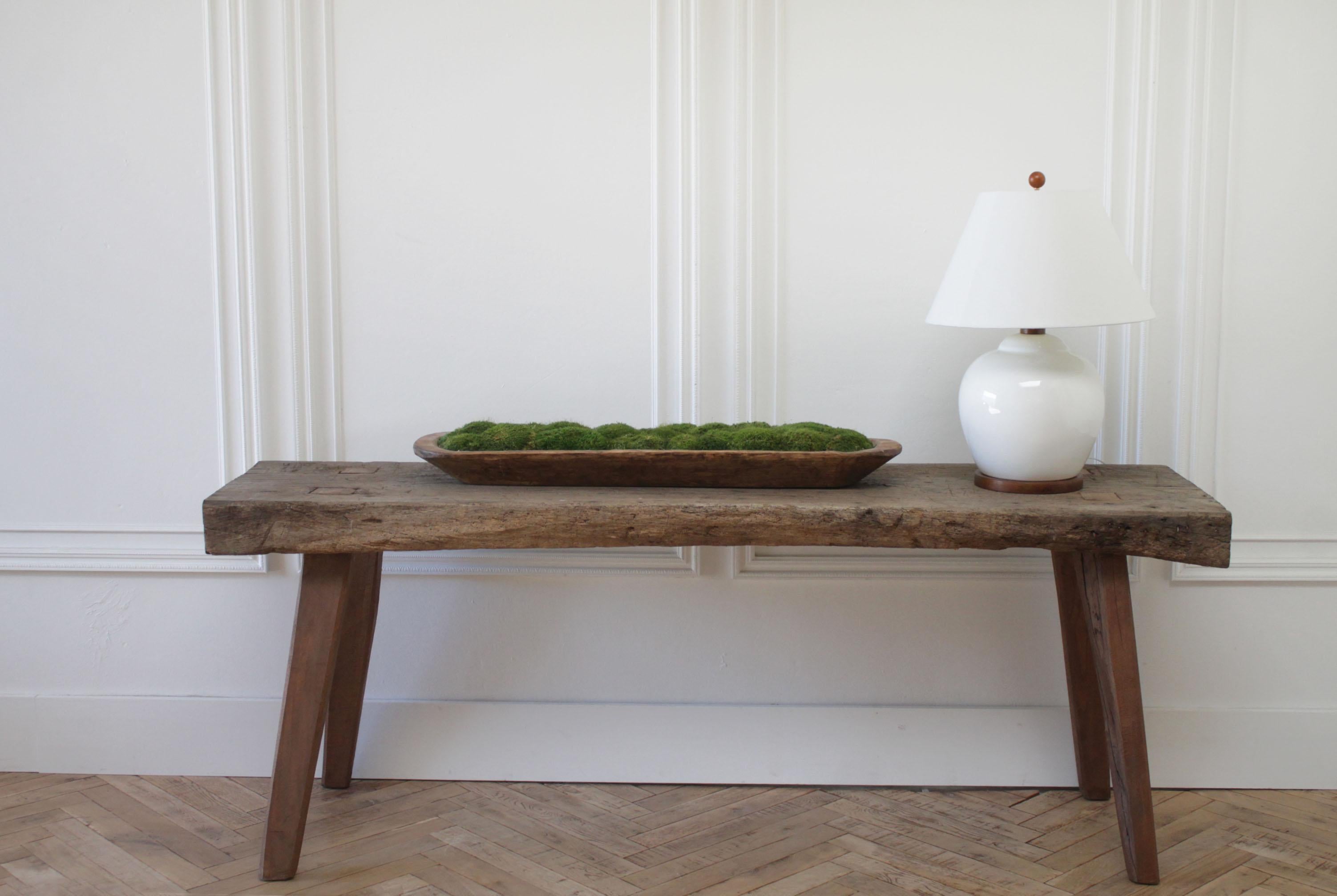 Antique Primitive style wood console table from Belgium
Large wood top, with lots of age and patina. This table is solid and sturdy, ready for everyday use as an entry, a console, or even a sofa table.
Measures: 78