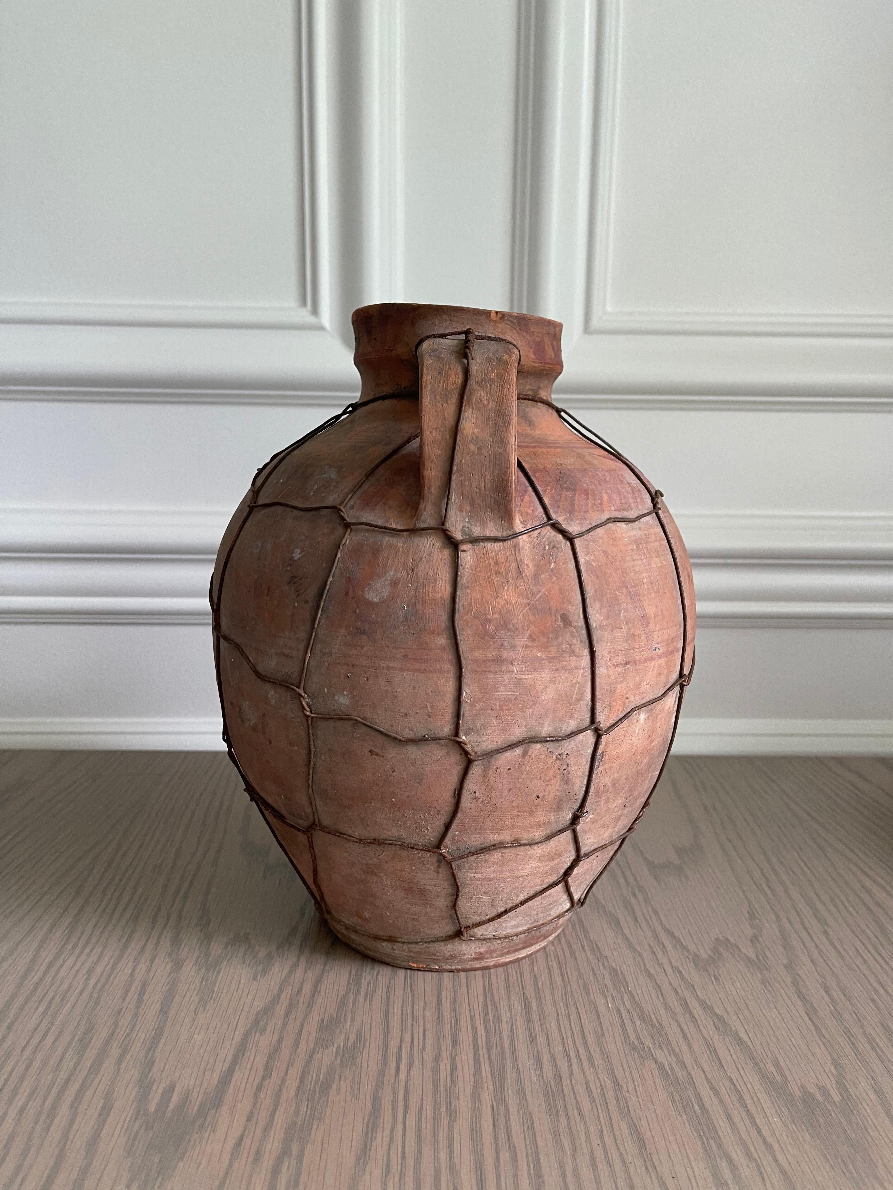 Beautiful antique terracotta vessel with handle c. 1900s. Originally used as a milk jug.