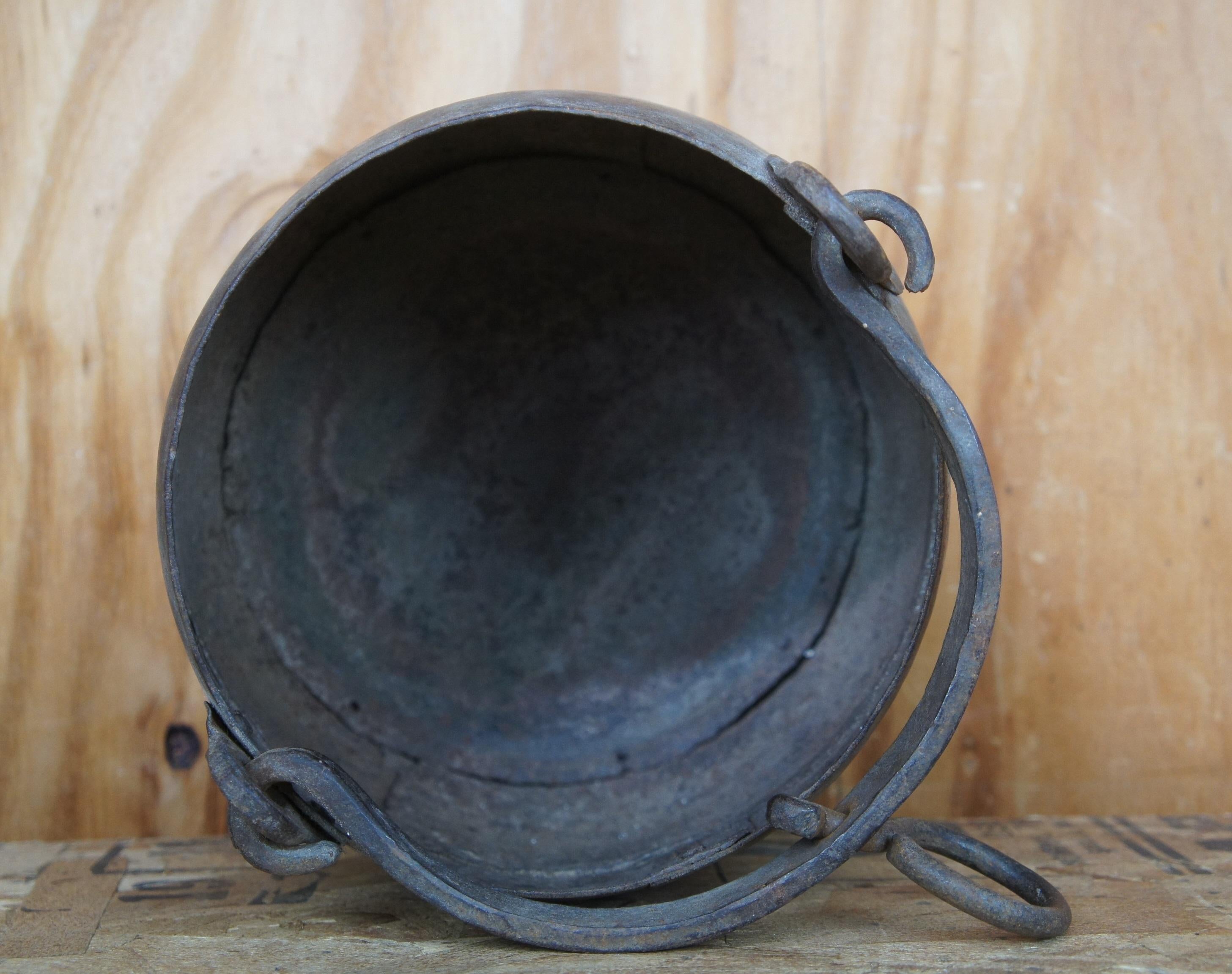 antique cast iron cauldron