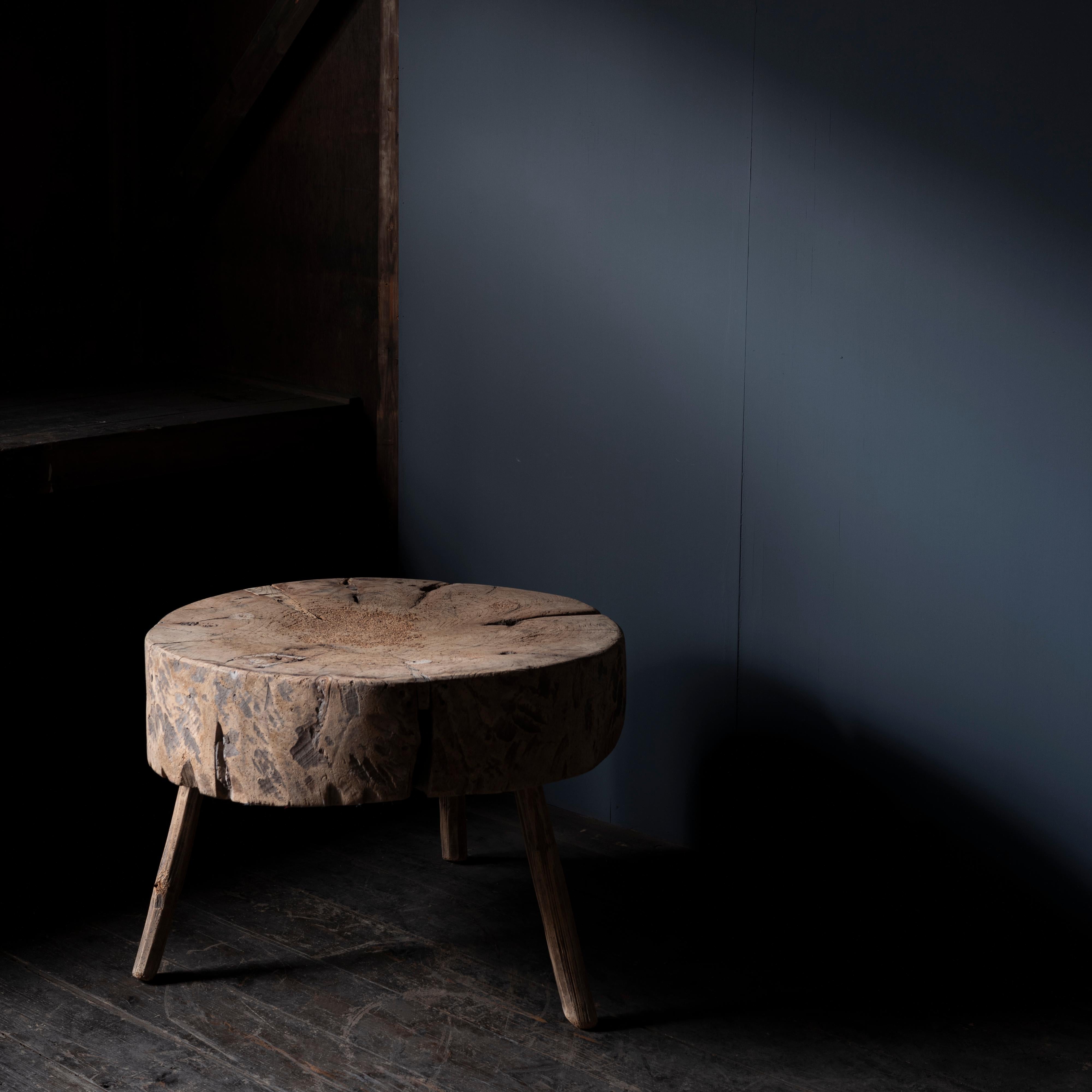 Antique primitive tree trunk table with beautiful patina from France.