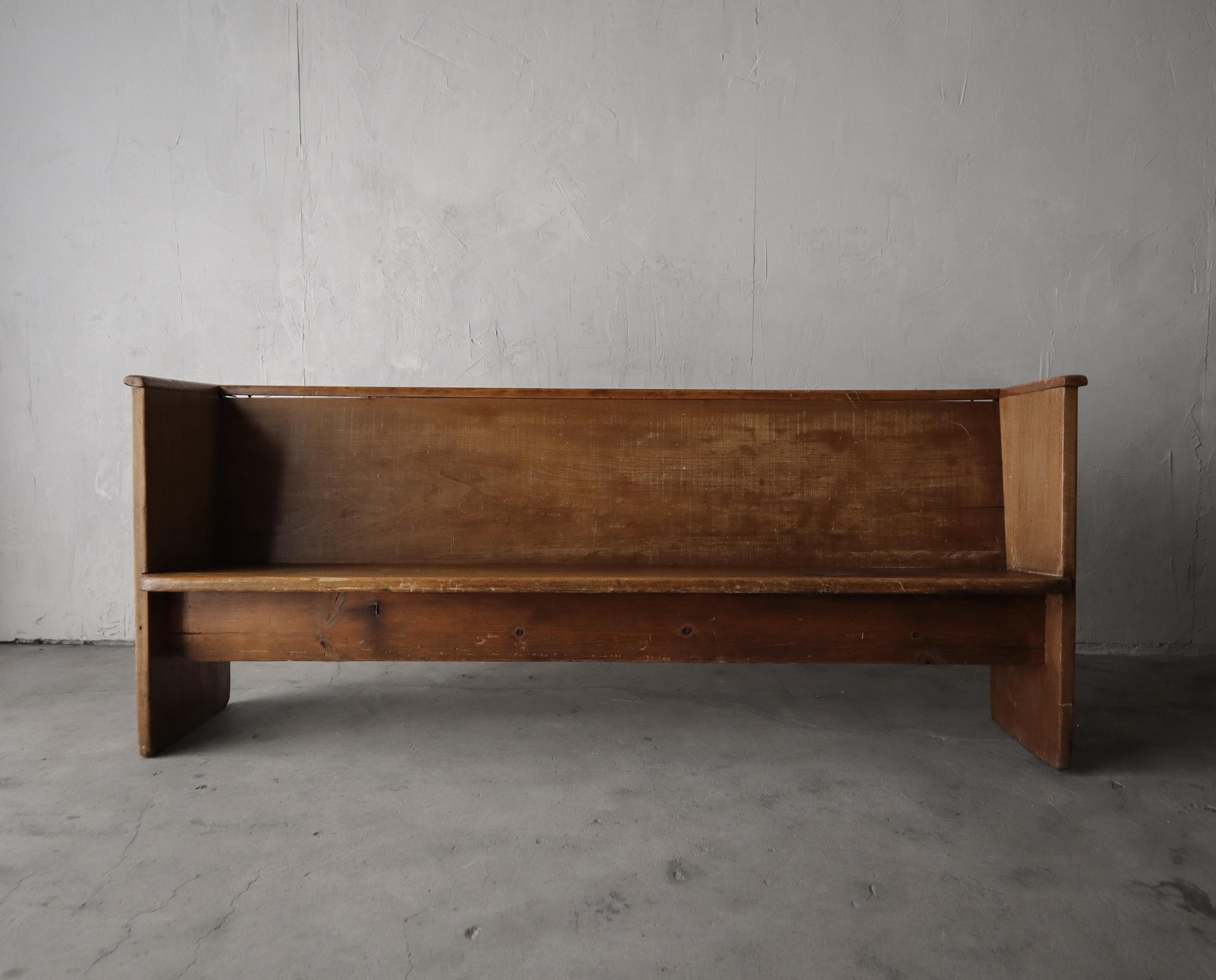 Beautiful handcrafted piece with beautiful patina. This antique bench has all the character a piece of this nature should.  I imagine it was used in an old church or schoolhouse.

The bench is long and narrow making it the perfect piece for an entry