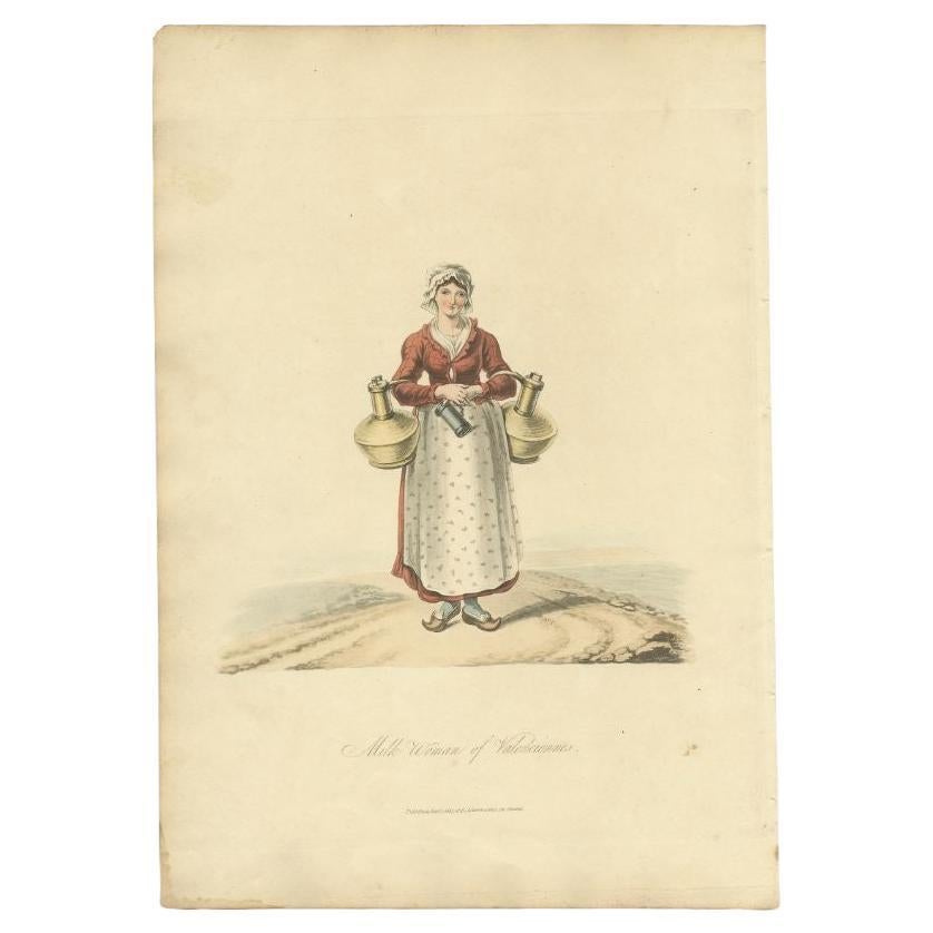 Antique costume print titled 'Milk Woman of Valenciennes'. Old costume print depicting a Milk Woman of Valenciennes. This print originates from 'The Costume of the Netherlands displayed in thirty coloured engravings'. 

Artists and Engravers: Made