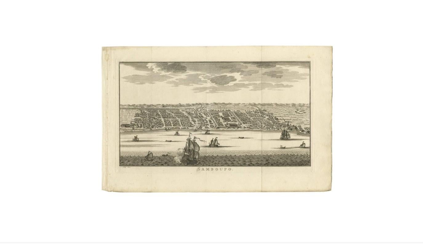Attractive detailed view of Samboupo on the island of Celebes (Sulawesi) Indonesia. This copper engraved print is a so called bird’s-eye perspective with great detail including the fort and hundreds of individual houses, several ships and local