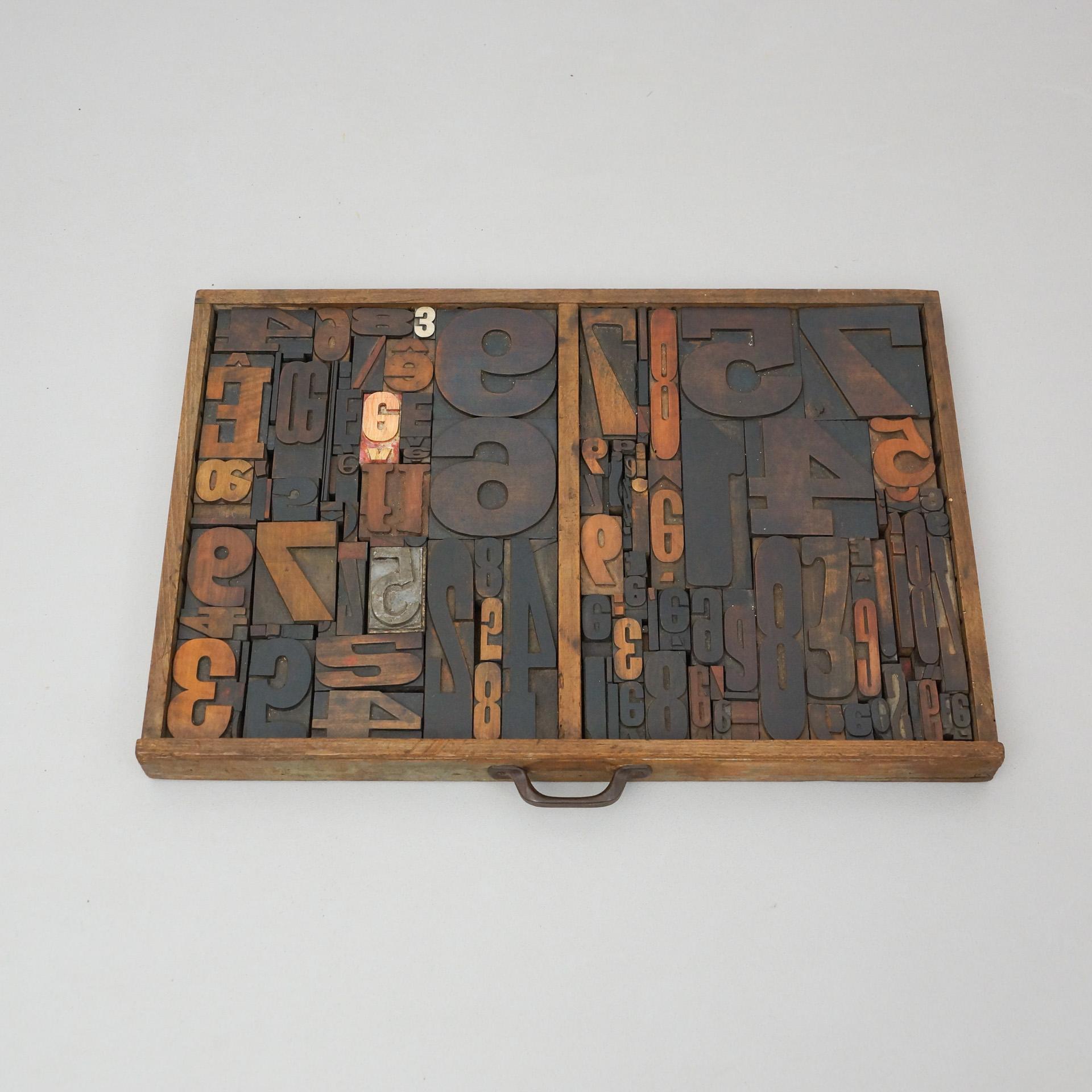 Antique Printing Drawer with Metal Numbering, Spain circa 1950.

In original condition, wear consistent with age and use, preserving a beautiful patina.

Materials:
Wood
Metal

Dimensions:
D 44 cm x W 65 cm x H 5 cm