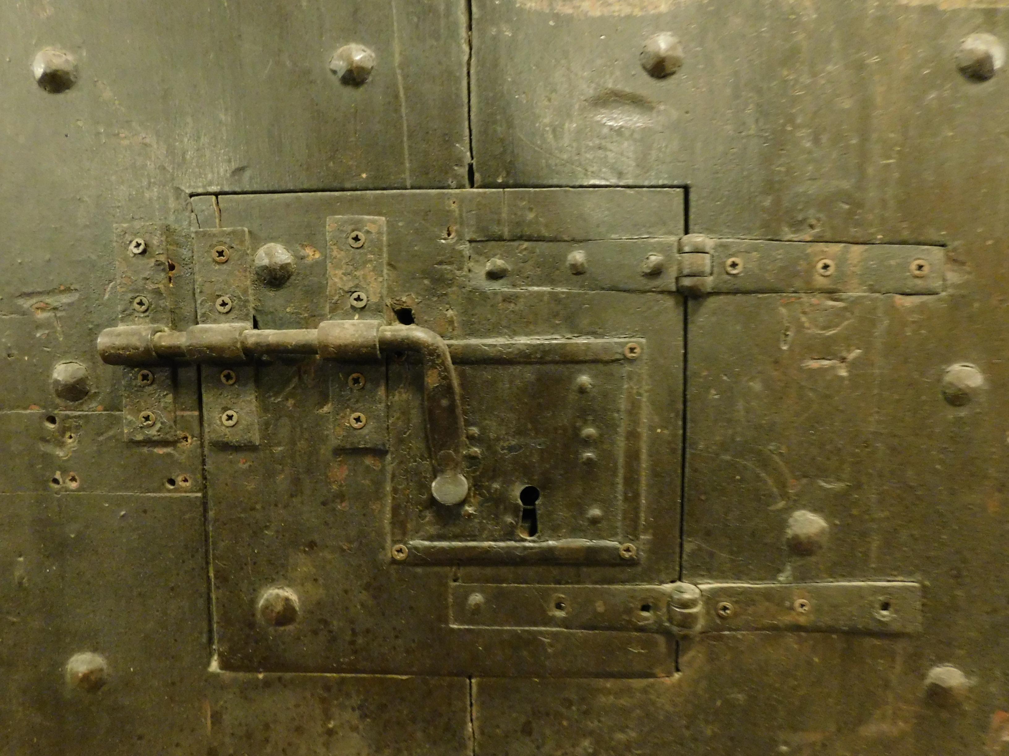 Wood Antique prison door in black wood with nails, Italian 
