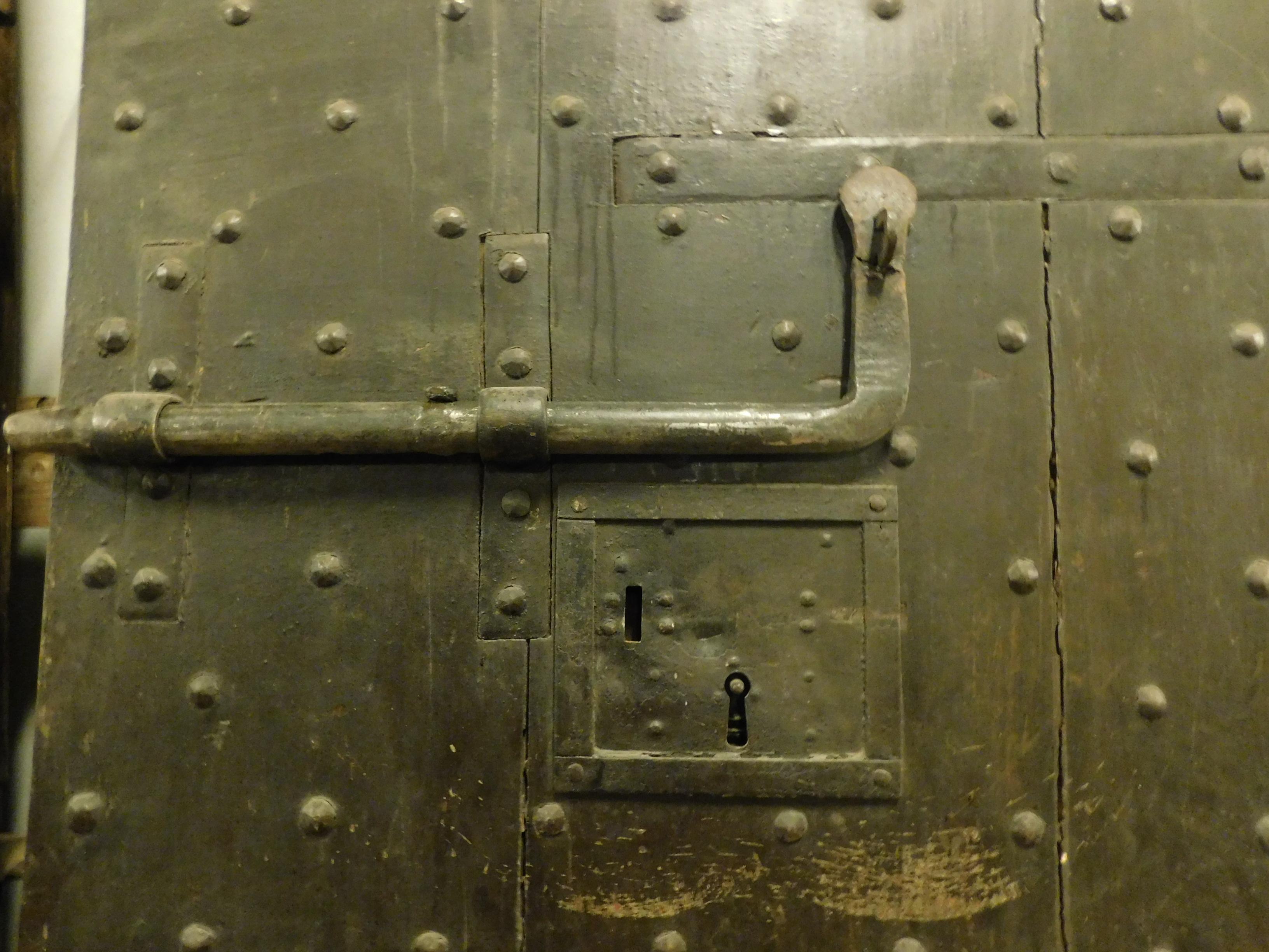 Antique prison door in black wood with nails, Italian  1