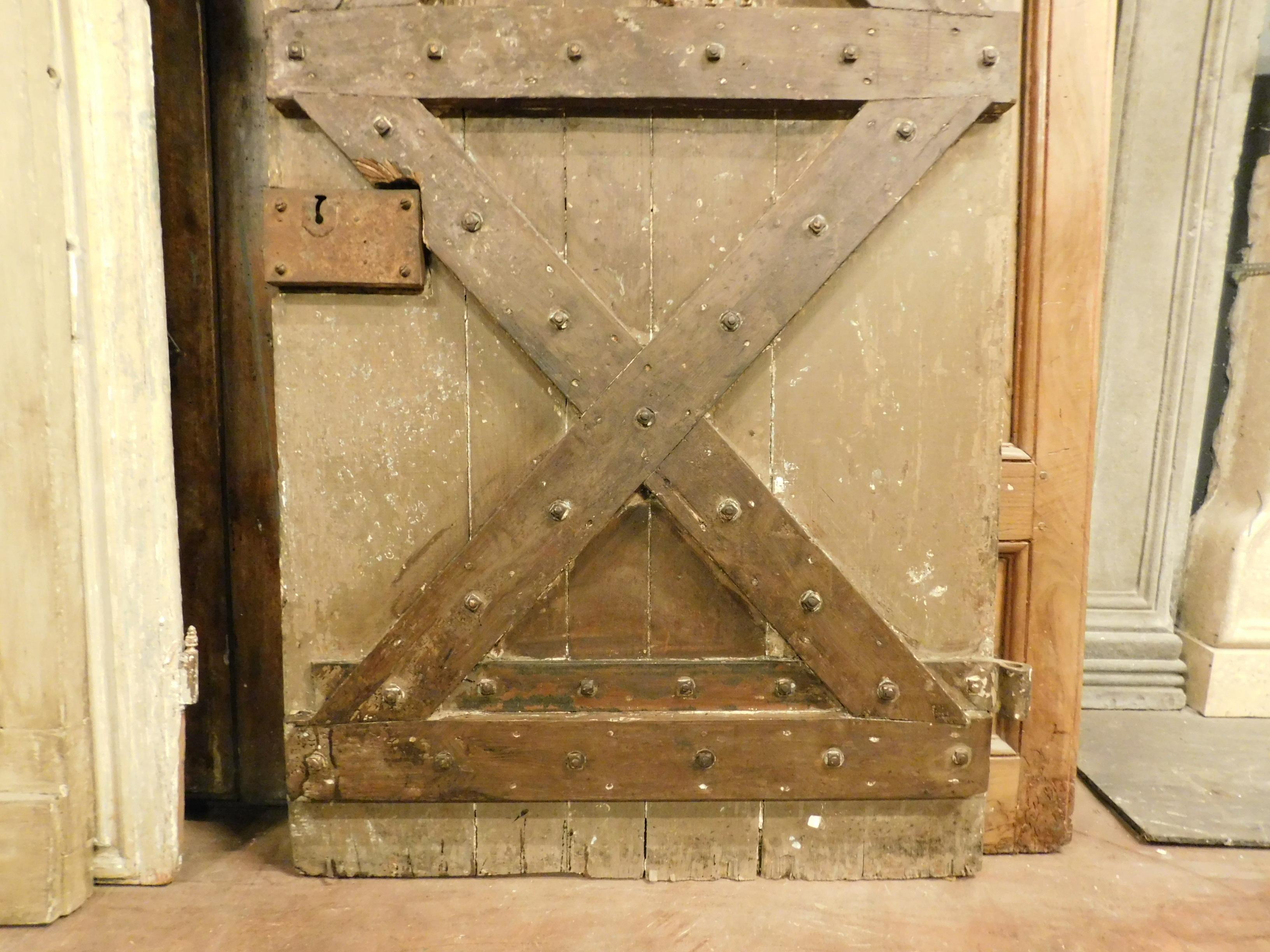 Hand-Carved Antique Prison Door Lacquered and with Original Irons, 19th Century Italy