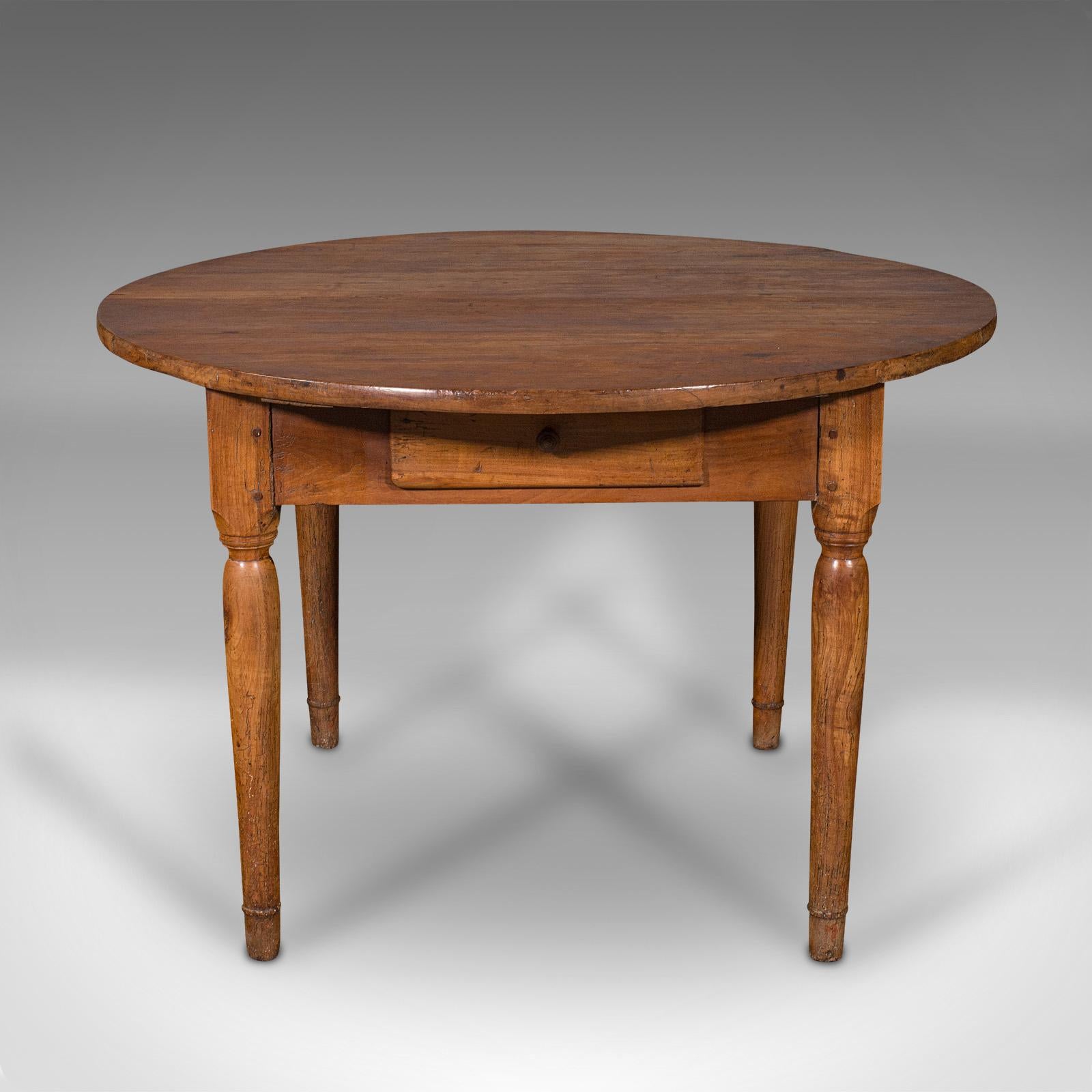 This is an antique Provençal baker's table. A French, fruitwood 4-seat kitchen or boulangerie table, dating to the late Victorian period, circa 1880.

Graced with a delightful patination, a treat for the townhouse or rustic chateau alike
Displays