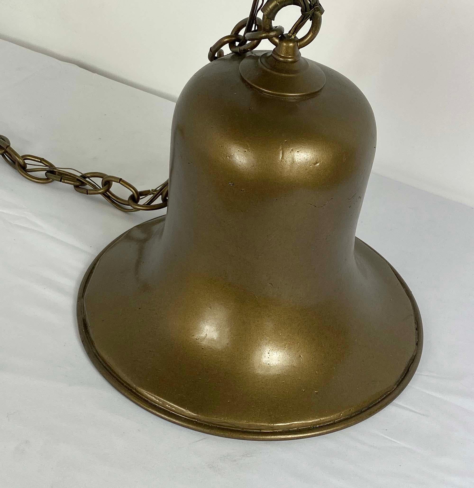 This cast iron pub bell with antique brass finish was hanging in the Ralph Lauren store in New York. We made this version for a customer in that city for their home pub. It does not ring, will make a statement in your Pub.