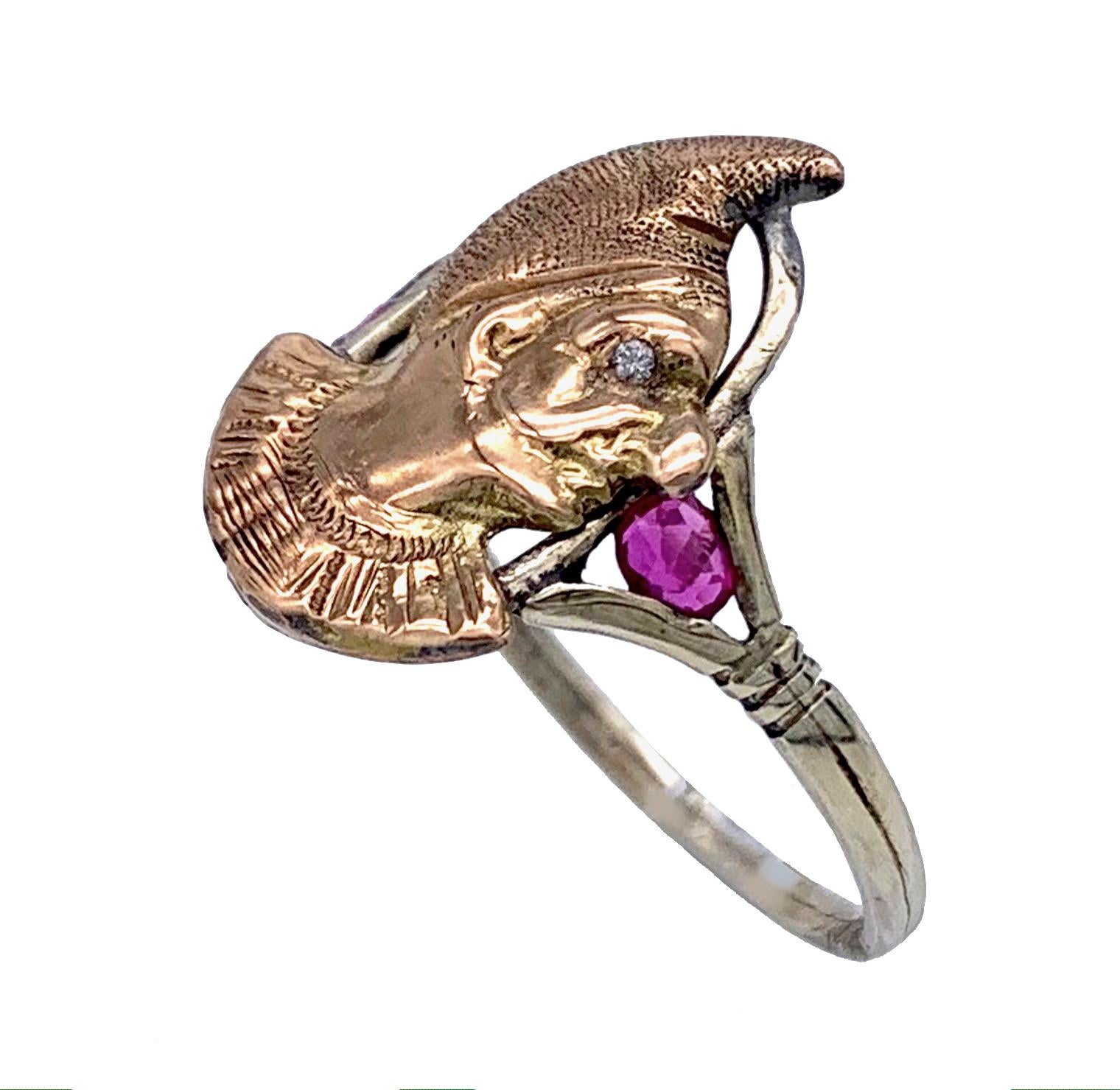 This is a lovely and rare Italian ring of Pulcinella in profile with a diamond eye, made out of three colour 10 karat gold.
 US size 7