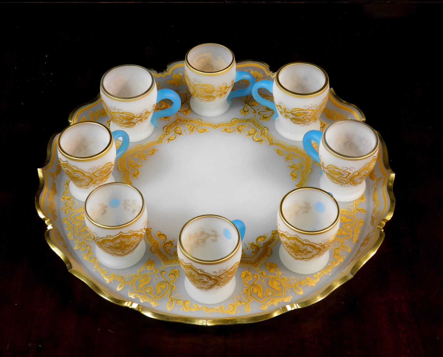 Antique punch bowl opal glass hand cut and gilded 
Made of opal glass, white and blue. Hand cut and beautifully painted with ocher colors, subsequently gilded. A beautiful thing from the end of the 19th century. Made in Europe. Bohemian  or France